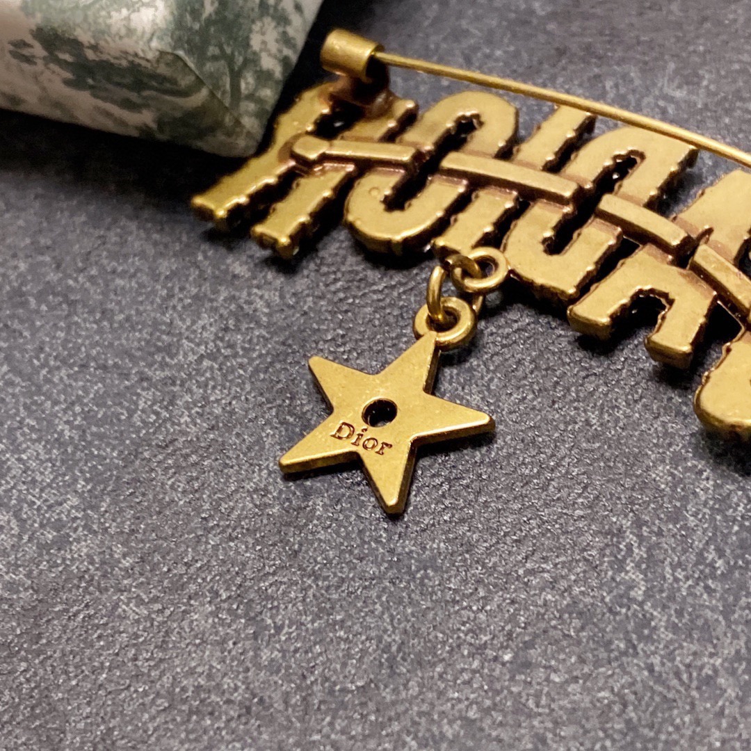 Dior J Adior brooch antique gold tone metal with clear crystal accents and gold star charm 4cm width