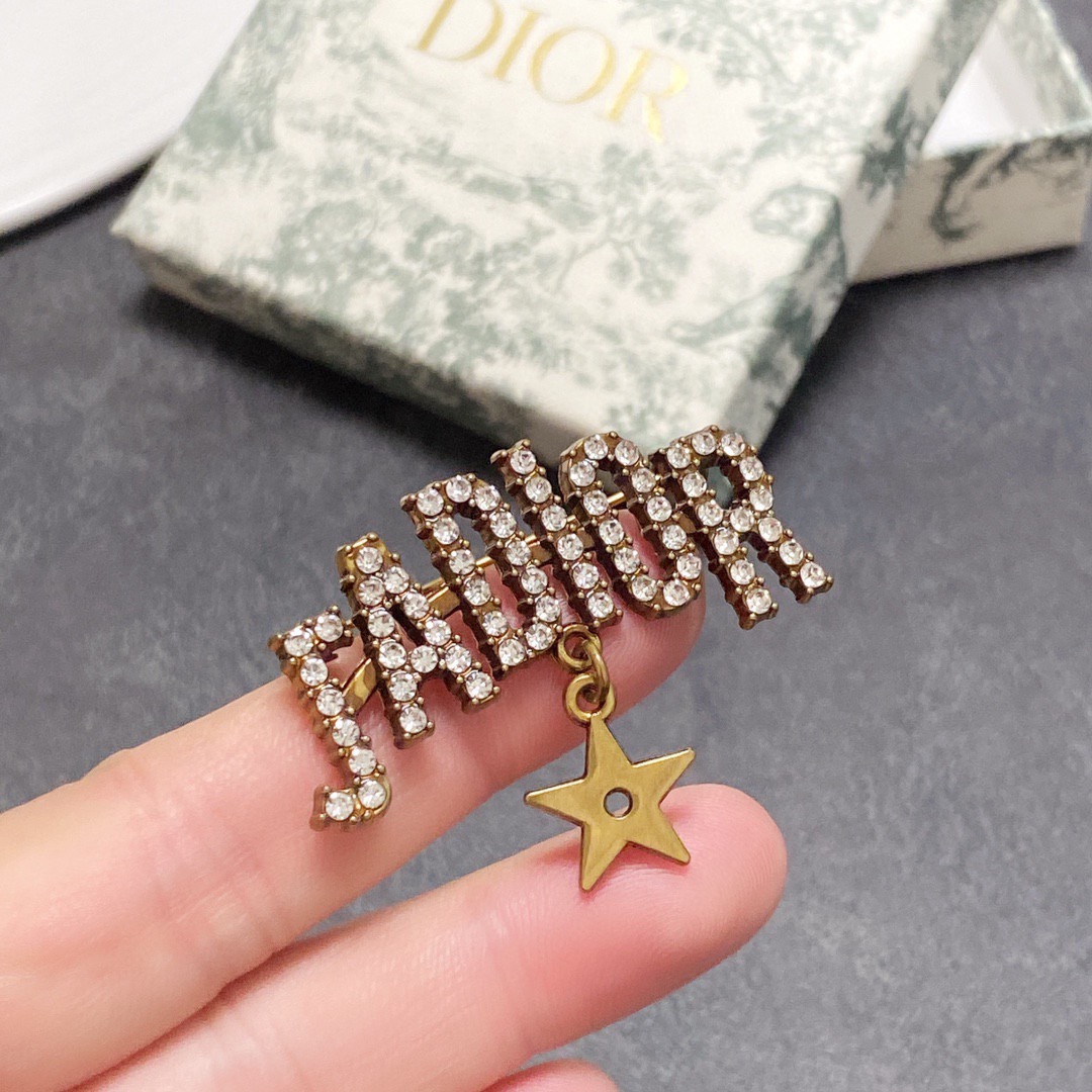 Dior J Adior brooch antique gold tone metal with clear crystal accents and gold star charm 4cm width