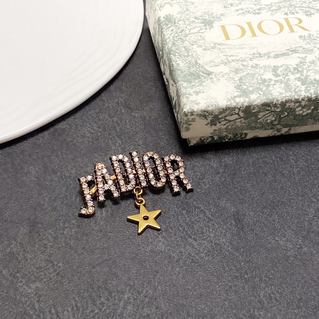 Dior J Adior brooch antique gold tone metal with clear crystal accents and gold star charm 4cm width