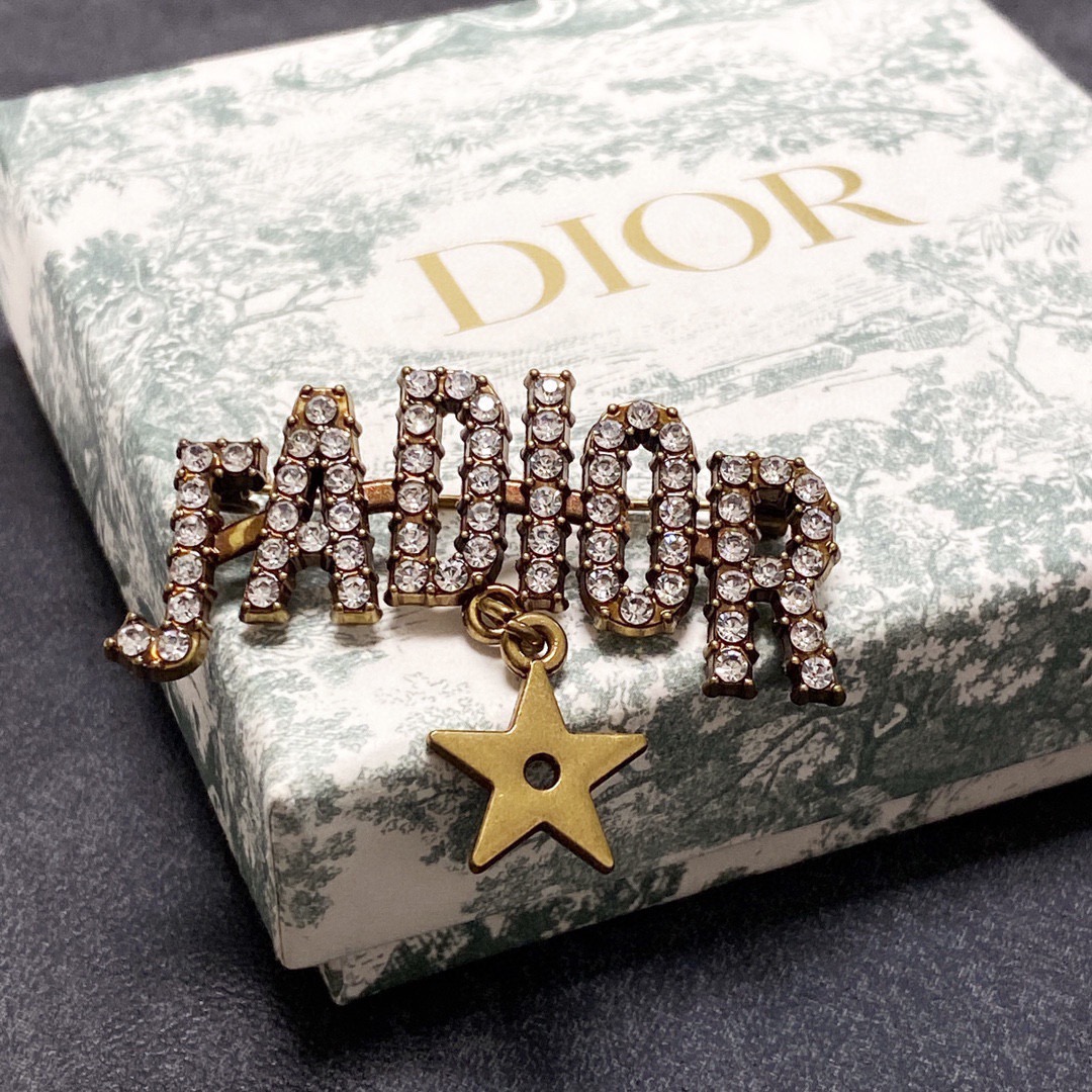 Dior J Adior brooch antique gold tone metal with clear crystal accents and gold star charm 4cm width