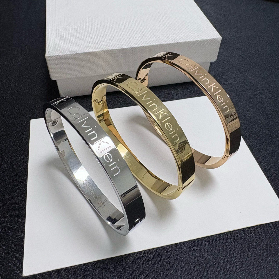 Calvin Klein CK Logo Engraved Bangle bracelet Silver Gold Rose Gold polished metal no gemstones 19cm