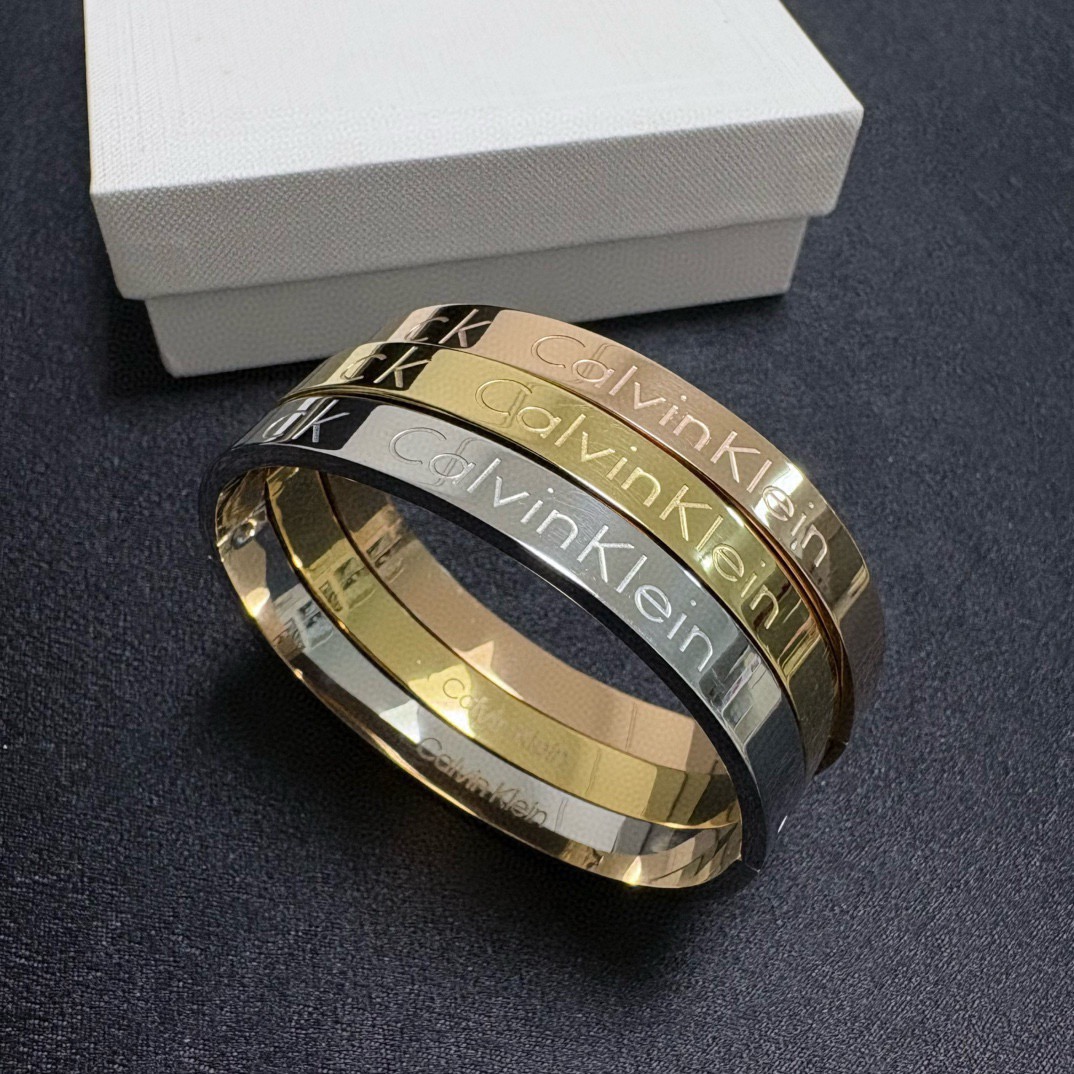 Calvin Klein CK Logo Engraved Bangle bracelet Silver Gold Rose Gold polished metal no gemstones 19cm