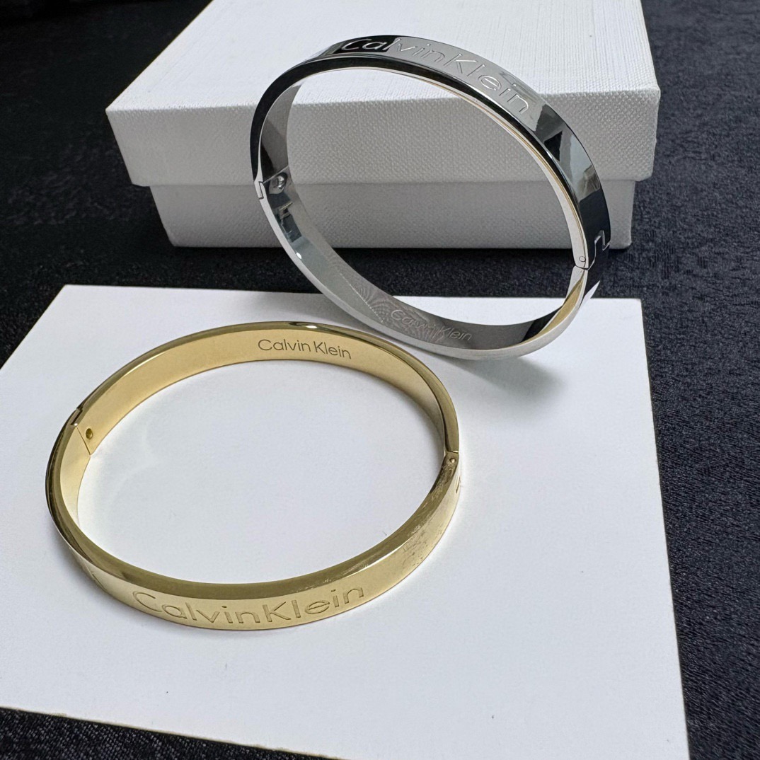 Calvin Klein CK Logo Engraved Bangle bracelet Silver Gold Rose Gold polished metal no gemstones 19cm