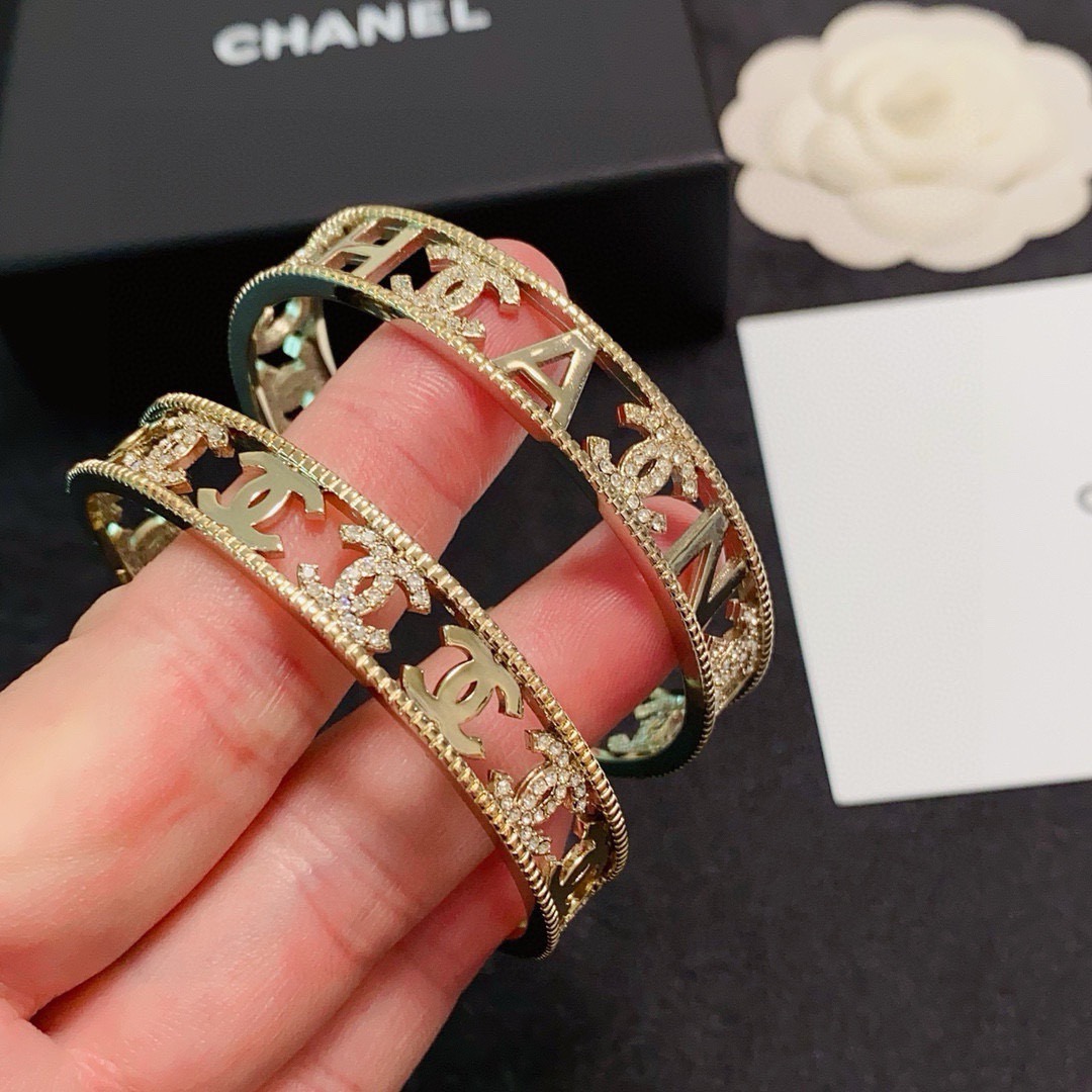 Chanel CC Logo Crystal Cutout Cuff bracelet Gold-tone metal with clear crystal accents One Size fits 15-17cm wrist
