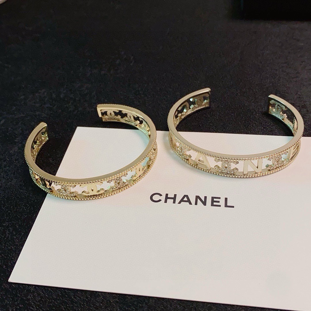 Chanel CC Logo Crystal Cutout Cuff bracelet Gold-tone metal with clear crystal accents One Size fits 15-17cm wrist