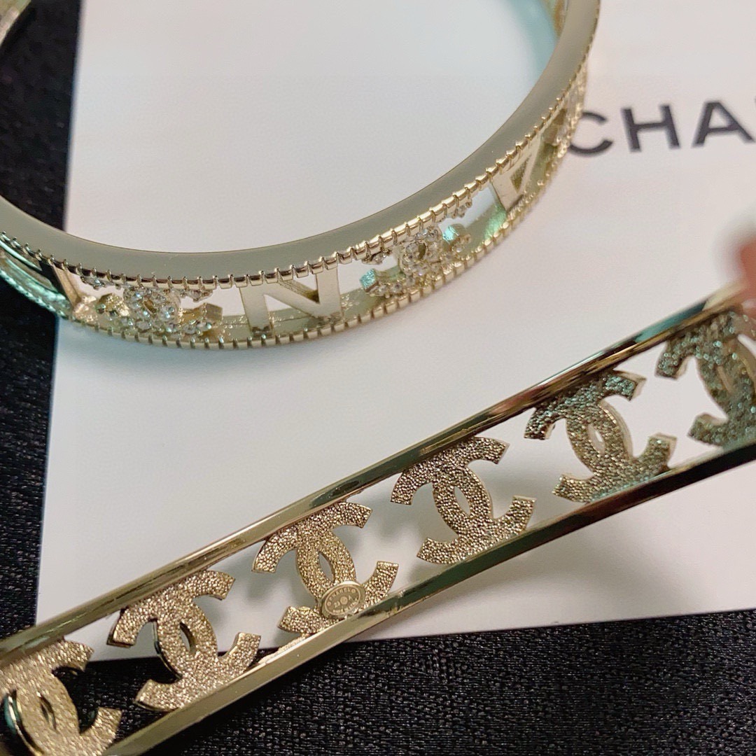 Chanel CC Logo Crystal Cutout Cuff bracelet Gold-tone metal with clear crystal accents One Size fits 15-17cm wrist