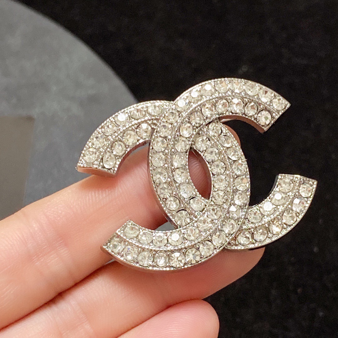 Chanel CC Logo Crystal Brooch brooch silver-tone metal with clear crystal pave gold-tone metal with clear crystal pave 3cm width