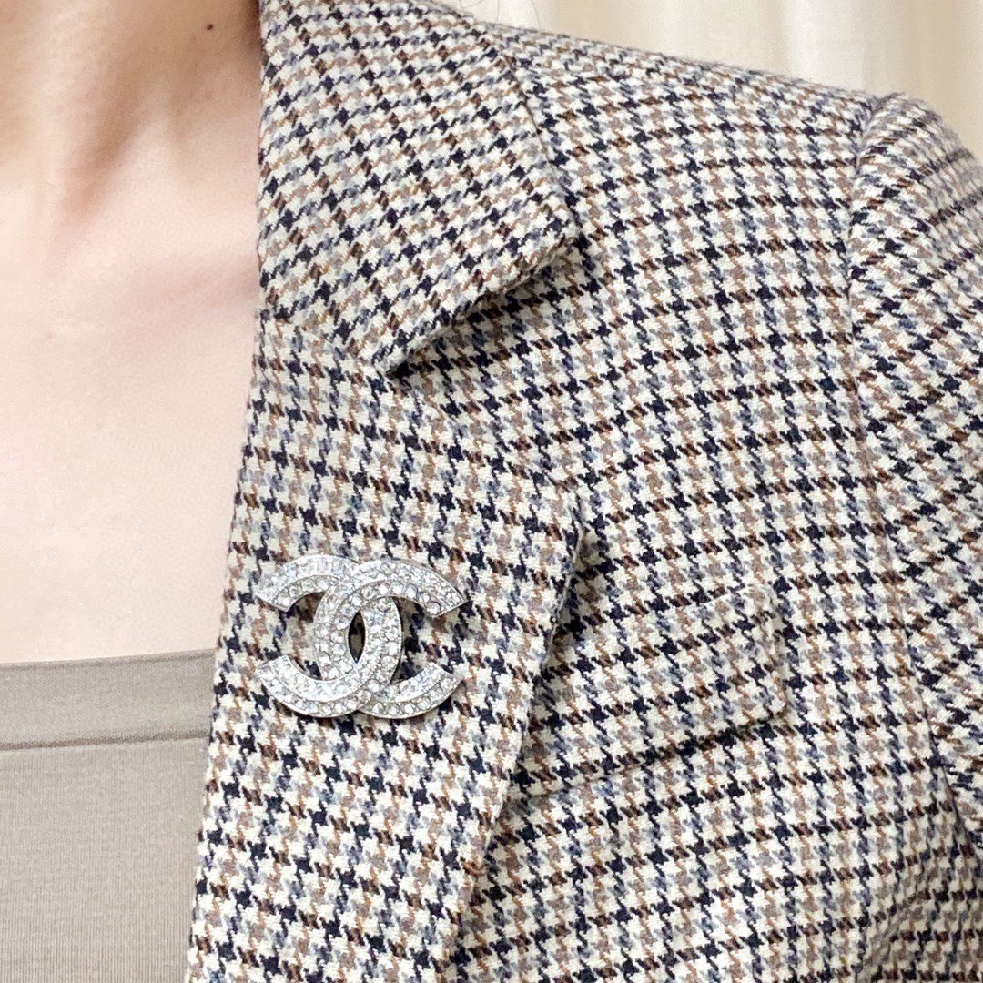 Chanel CC Logo Crystal Brooch brooch silver-tone metal with clear crystal pave gold-tone metal with clear crystal pave 3cm width