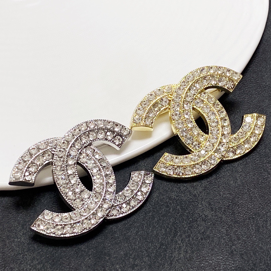 Chanel CC Logo Crystal Brooch brooch silver-tone metal with clear crystal pave gold-tone metal with clear crystal pave 3cm width