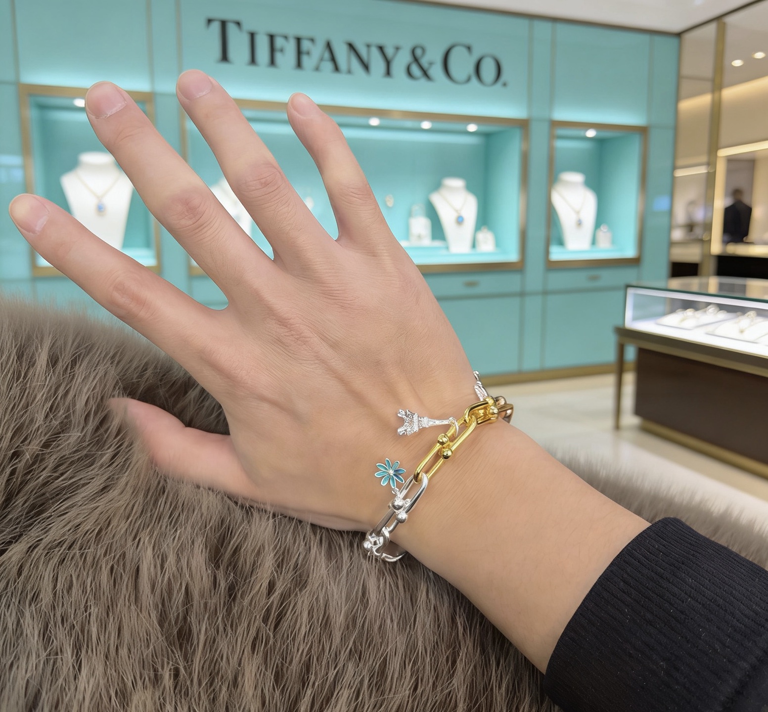 Tiffany Co HardWear Charm Bracelet bracelet Tri-tone sterling silver 18k yellow gold 18k rose gold metal with blue enamel daisy silver key charm silver Eiffel Tower charm 7 inches