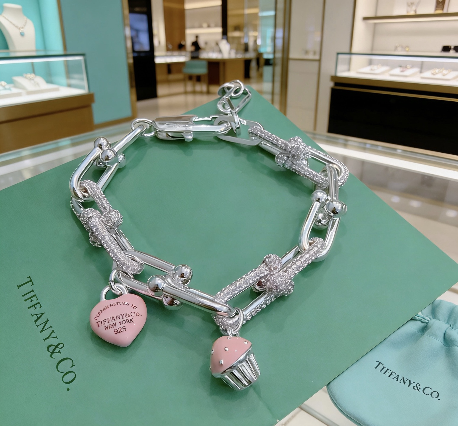 Tiffany Co Return to Tiffany HardWear Charm Bracelet bracelet Sterling silver with clear pave diamonds pink enamel heart and cupcake charms 7 inches