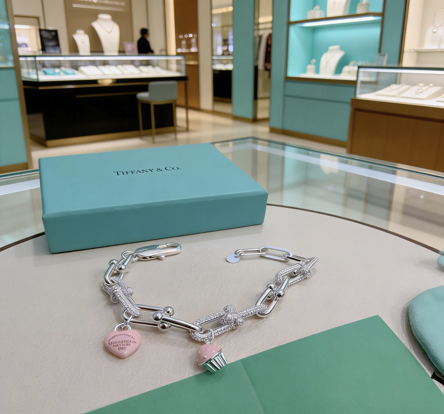 Tiffany Co Return to Tiffany HardWear Charm Bracelet bracelet Sterling silver with clear pave diamonds pink enamel heart and cupcake charms 7 inches
