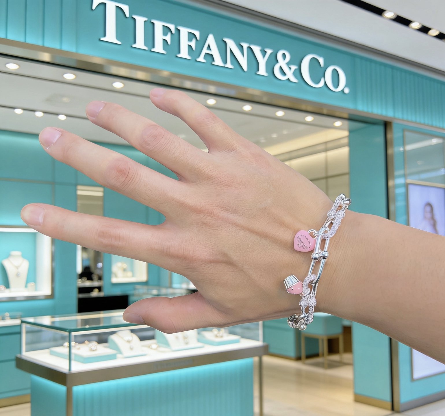 Tiffany Co Return to Tiffany HardWear Charm Bracelet bracelet Sterling silver with clear pave diamonds pink enamel heart and cupcake charms 7 inches