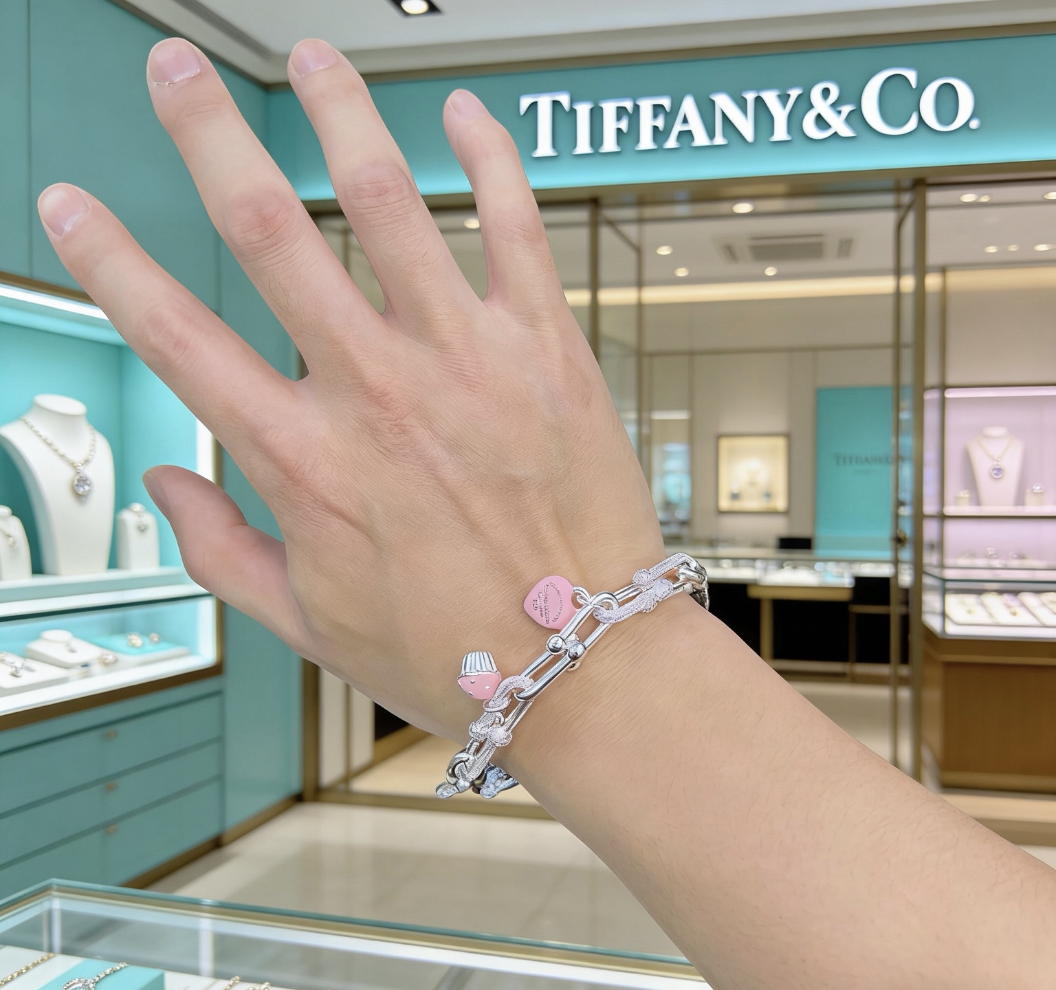 Tiffany Co Return to Tiffany HardWear Charm Bracelet bracelet Sterling silver with clear pave diamonds pink enamel heart and cupcake charms 7 inches