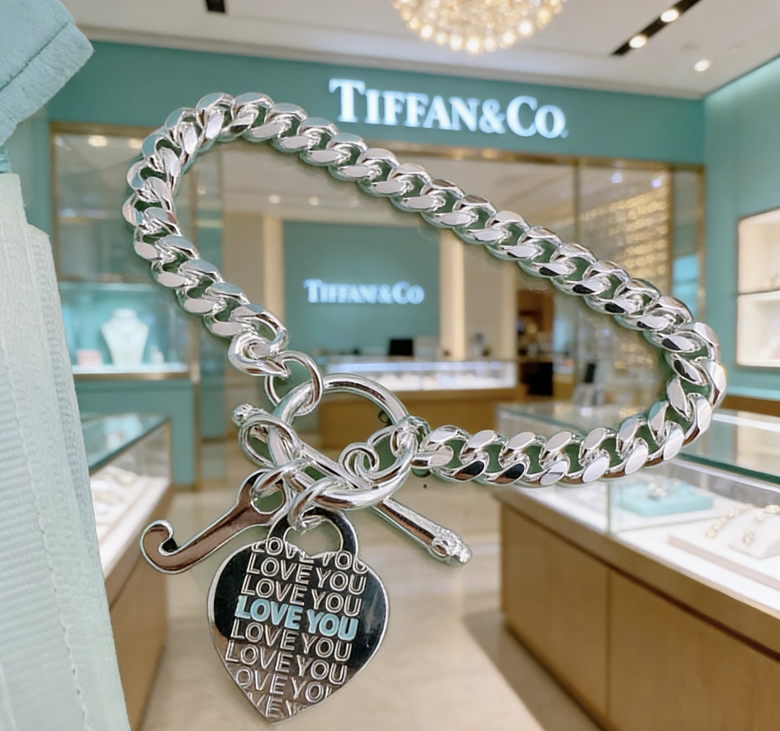 Tiffany Co Love You Heart Tag Toggle Curb Chain bracelet sterling silver with light blue enamel text accents 7 inches