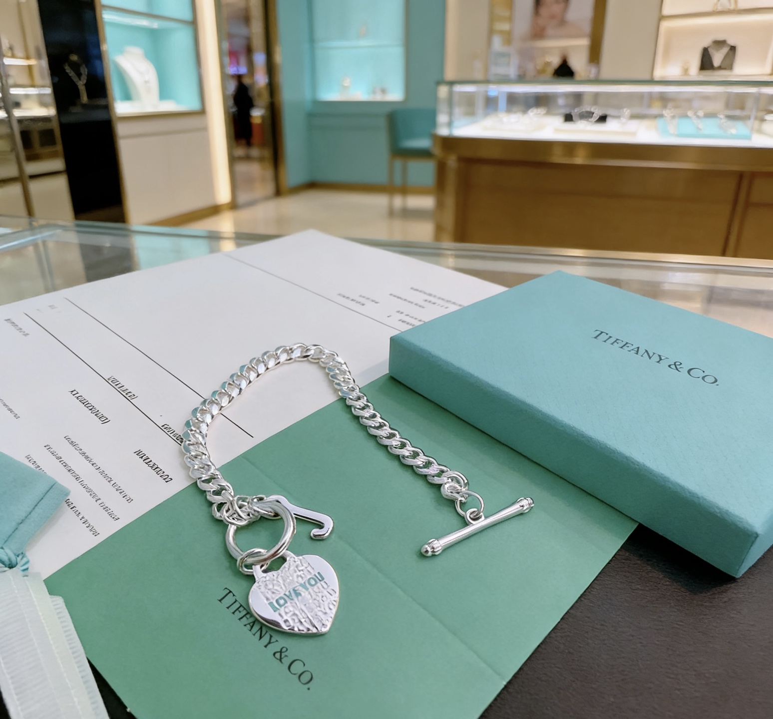 Tiffany Co Love You Heart Tag Toggle Curb Chain bracelet sterling silver with light blue enamel text accents 7 inches