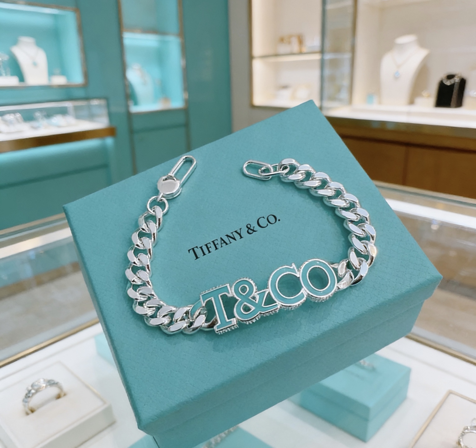 Tiffany Co T CO Logo Curb Chain bracelet Sterling silver with Tiffany Blue enamel 7 inches