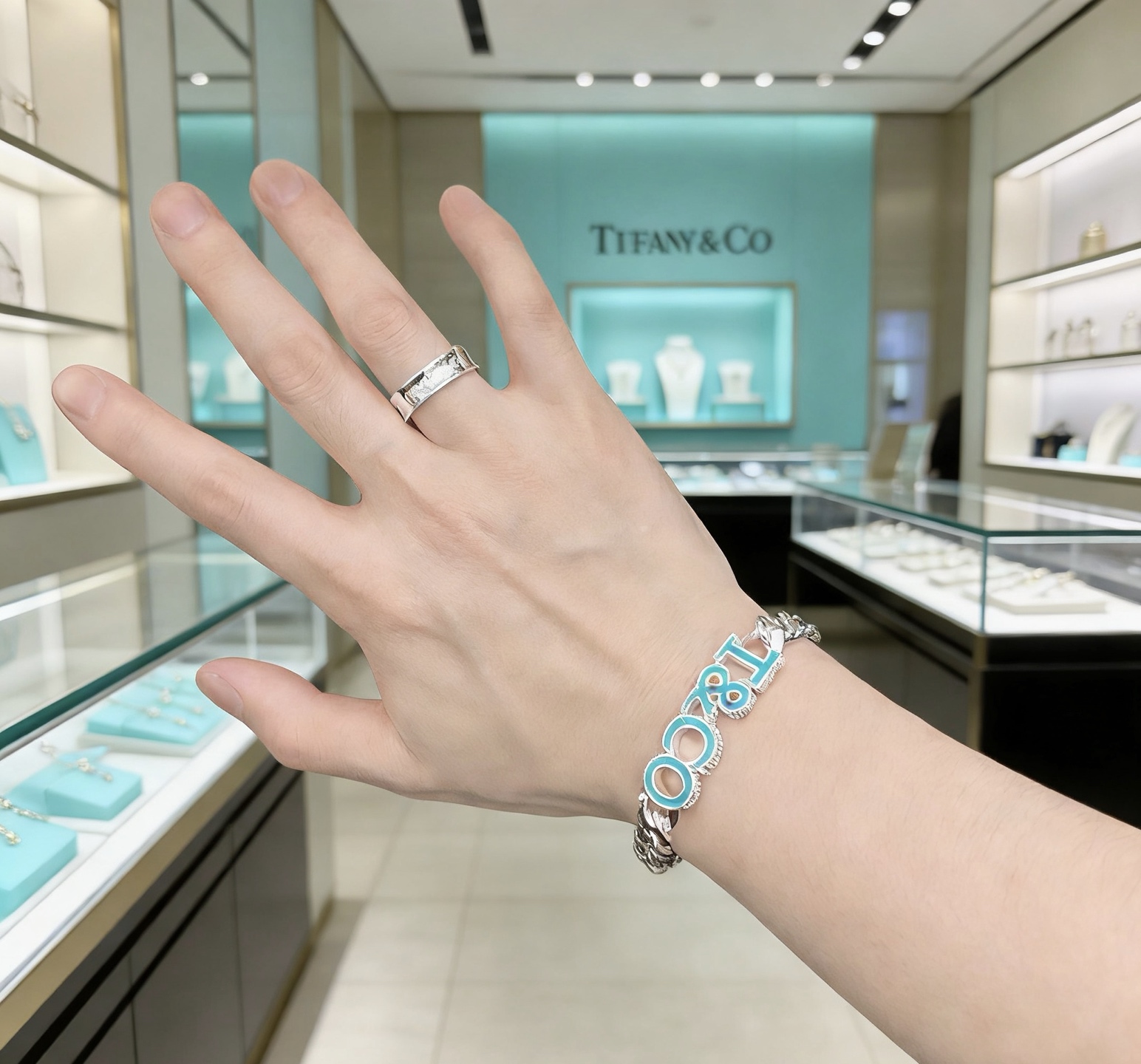 Tiffany Co T CO Logo Curb Chain bracelet Sterling silver with Tiffany Blue enamel 7 inches