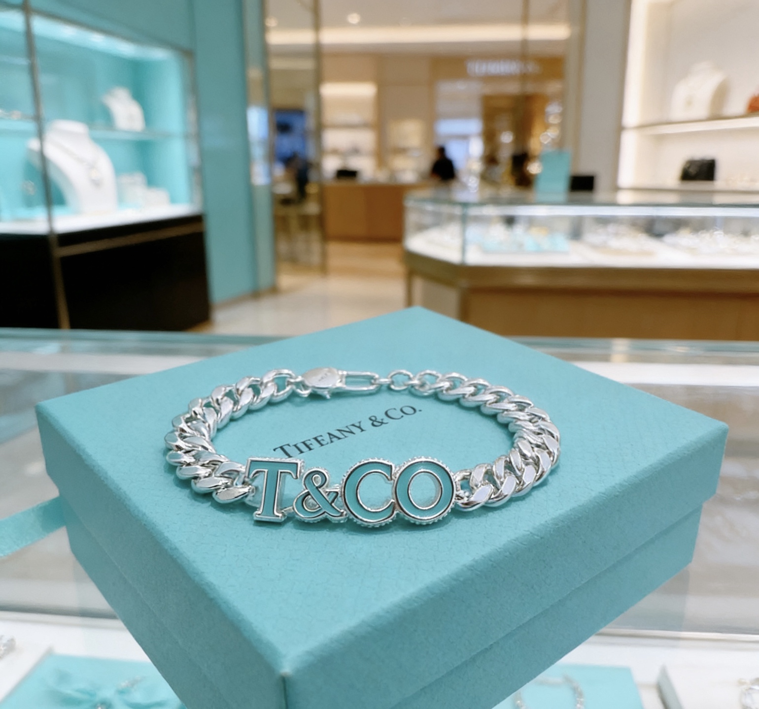 Tiffany Co T CO Logo Curb Chain bracelet Sterling silver with Tiffany Blue enamel 7 inches