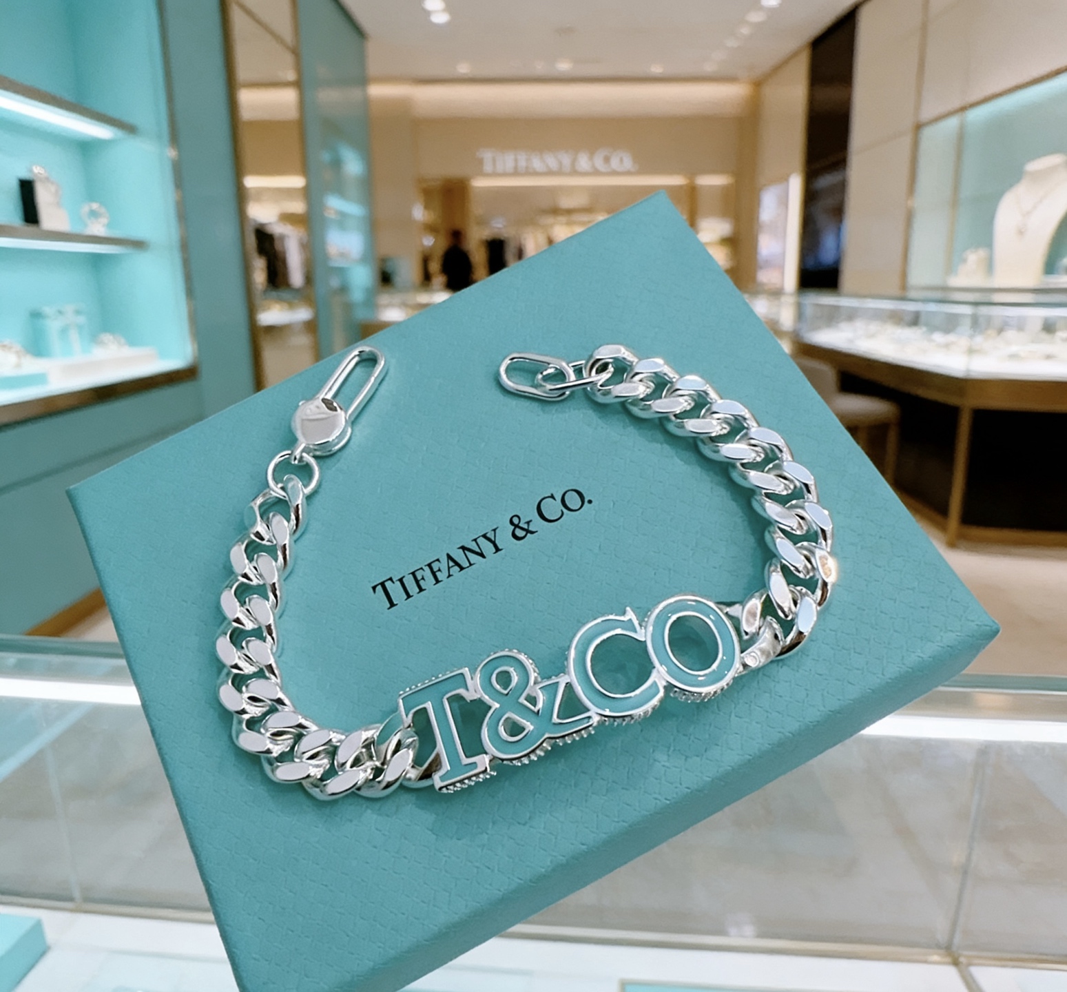 Tiffany Co T CO Logo Curb Chain bracelet Sterling silver with Tiffany Blue enamel 7 inches
