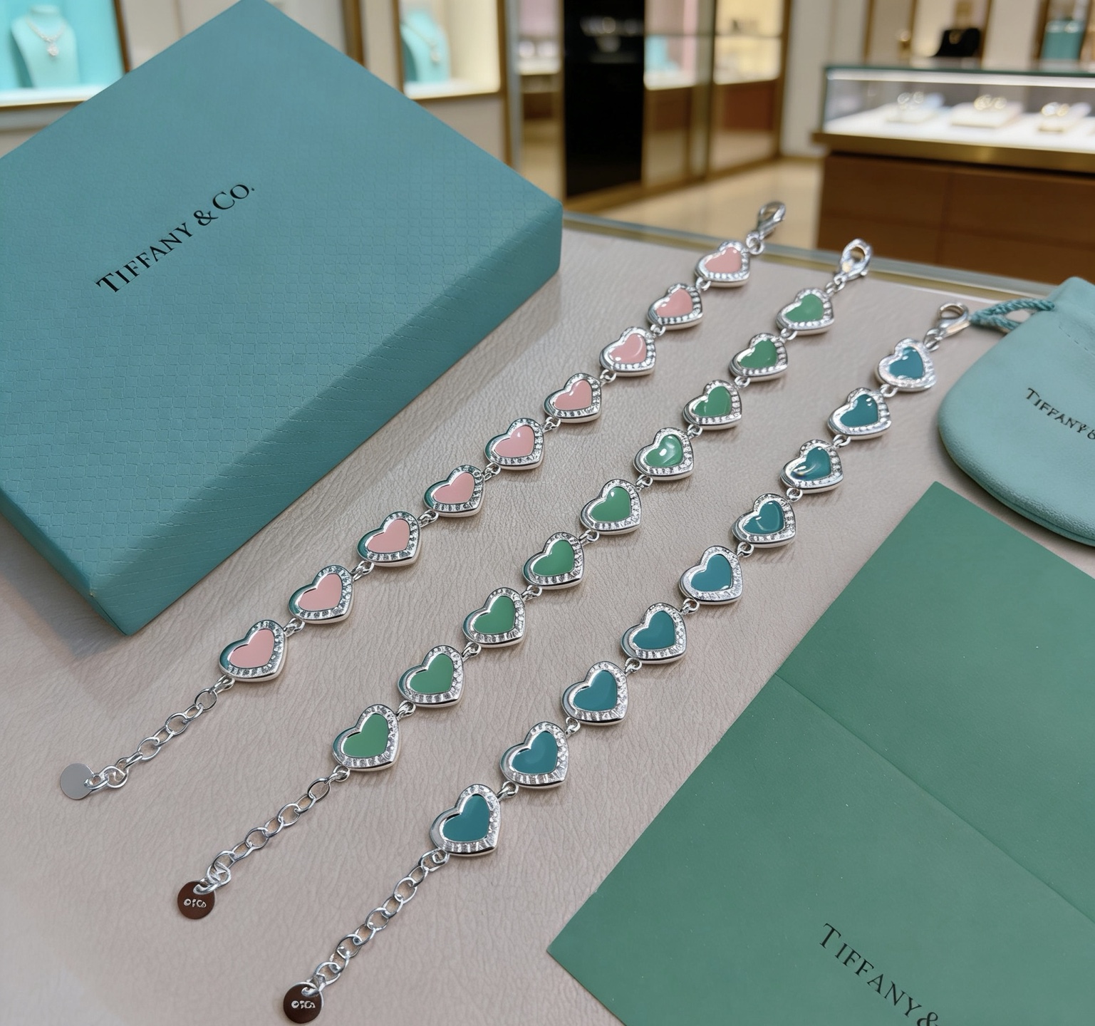 Tiffany Co Heart Link bracelet silver-toned metal with tiffany blue enamel and clear diamond accents 18cm