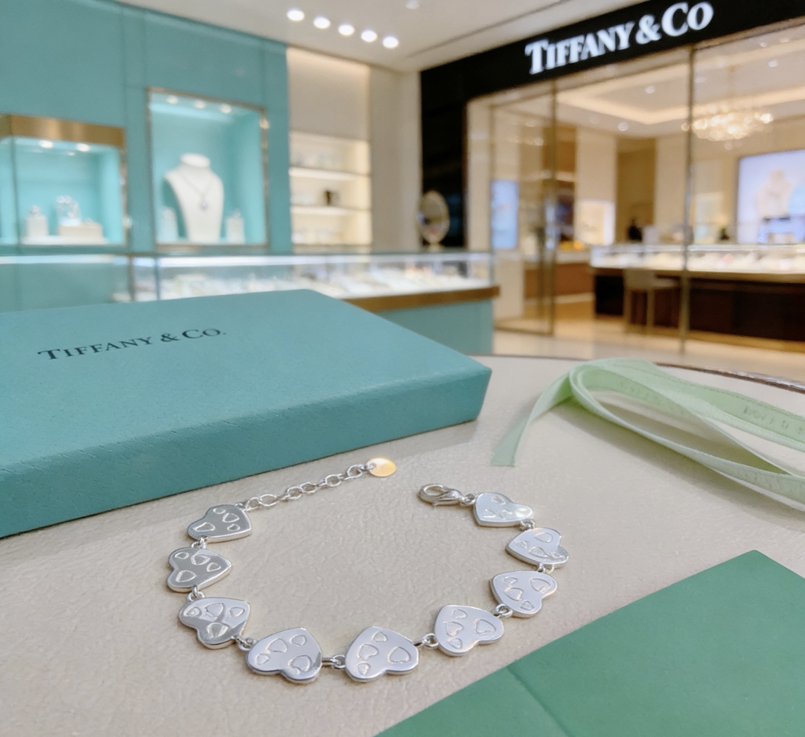Tiffany Co Heart Link bracelet silver-toned metal with tiffany blue enamel and clear diamond accents 18cm