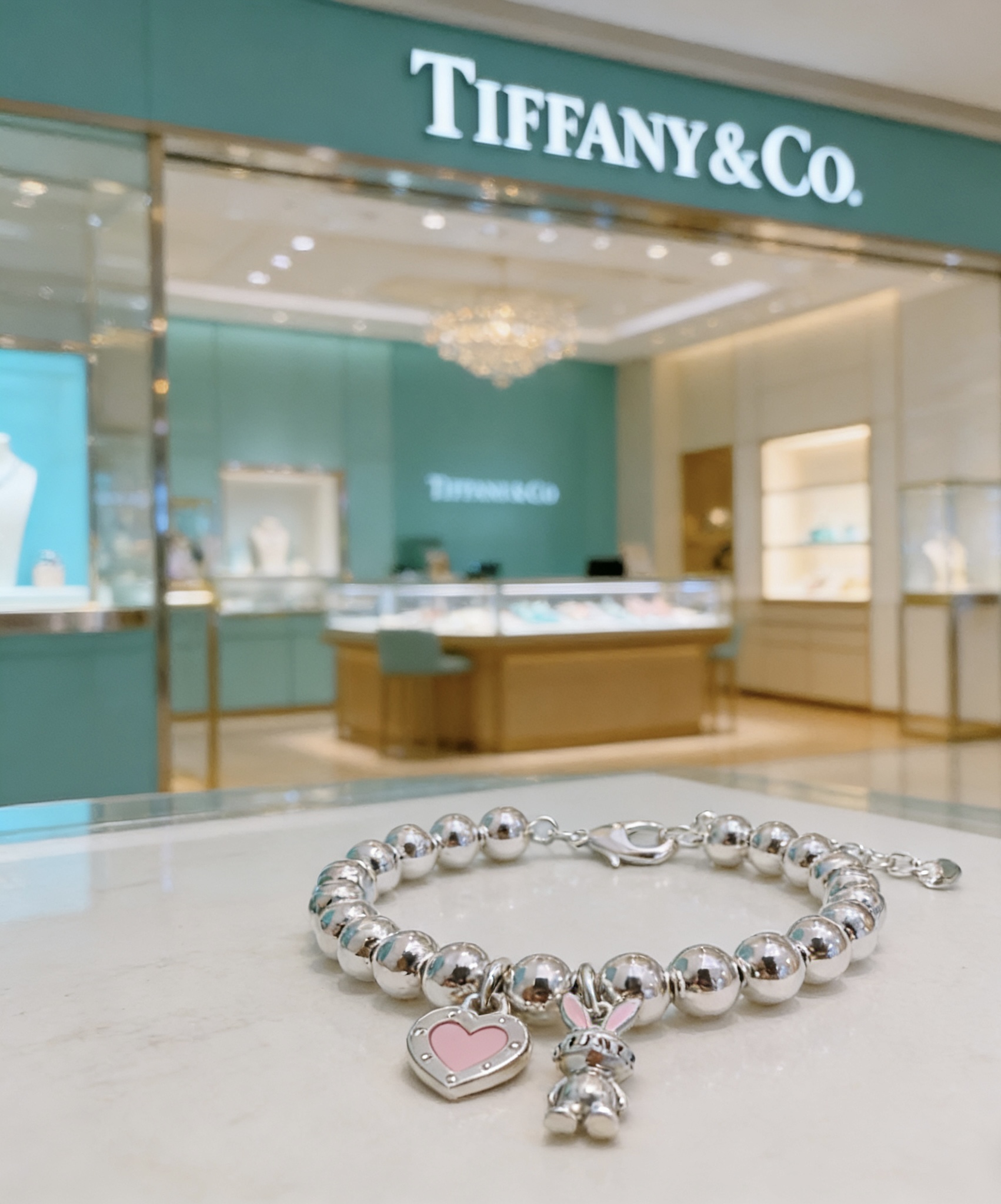 Tiffany Co Return to Tiffany Bead Charm Bracelet bracelet Silver metal with pink enamel accents 18cm