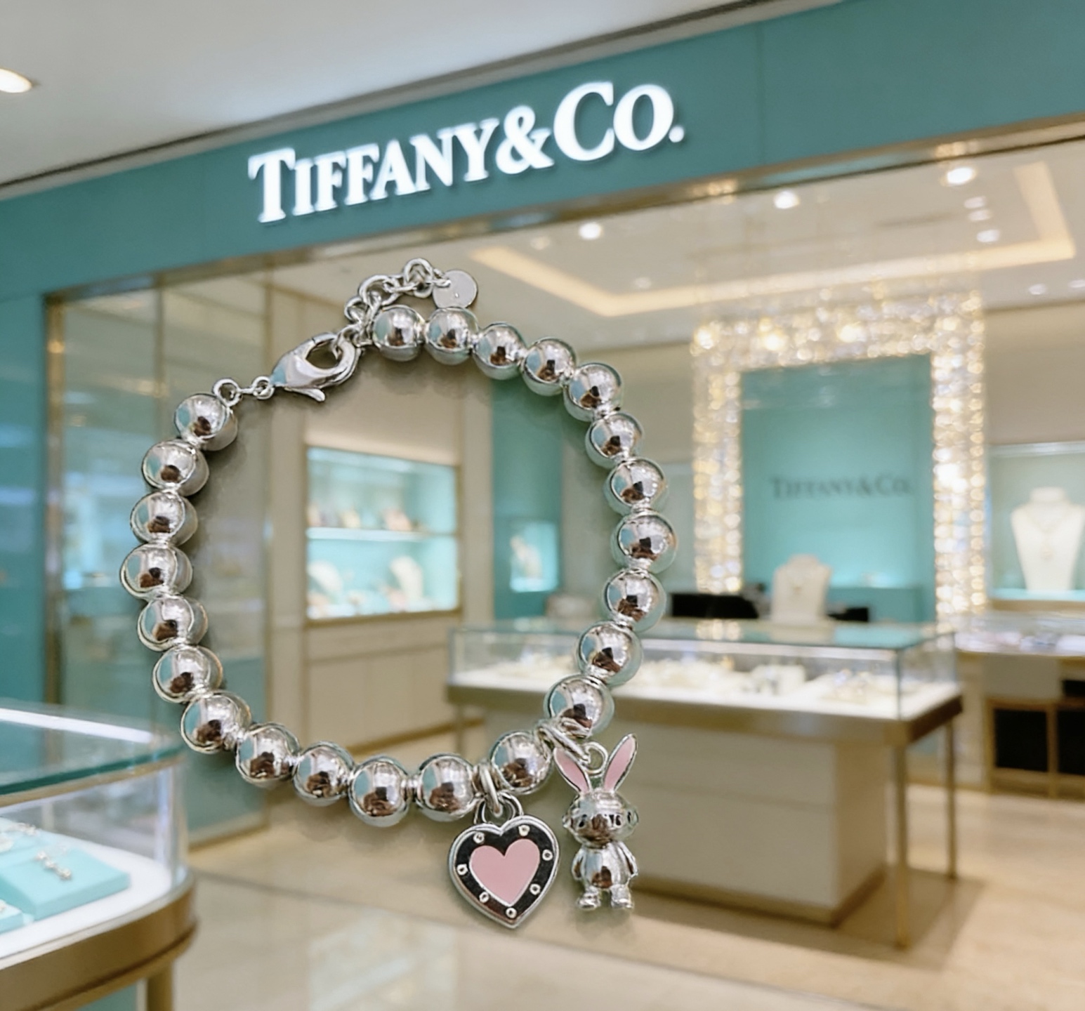 Tiffany Co Return to Tiffany Bead Charm Bracelet bracelet Silver metal with pink enamel accents 18cm