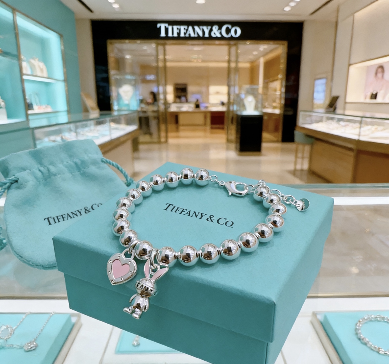 Tiffany Co Return to Tiffany Bead Charm Bracelet bracelet Silver metal with pink enamel accents 18cm
