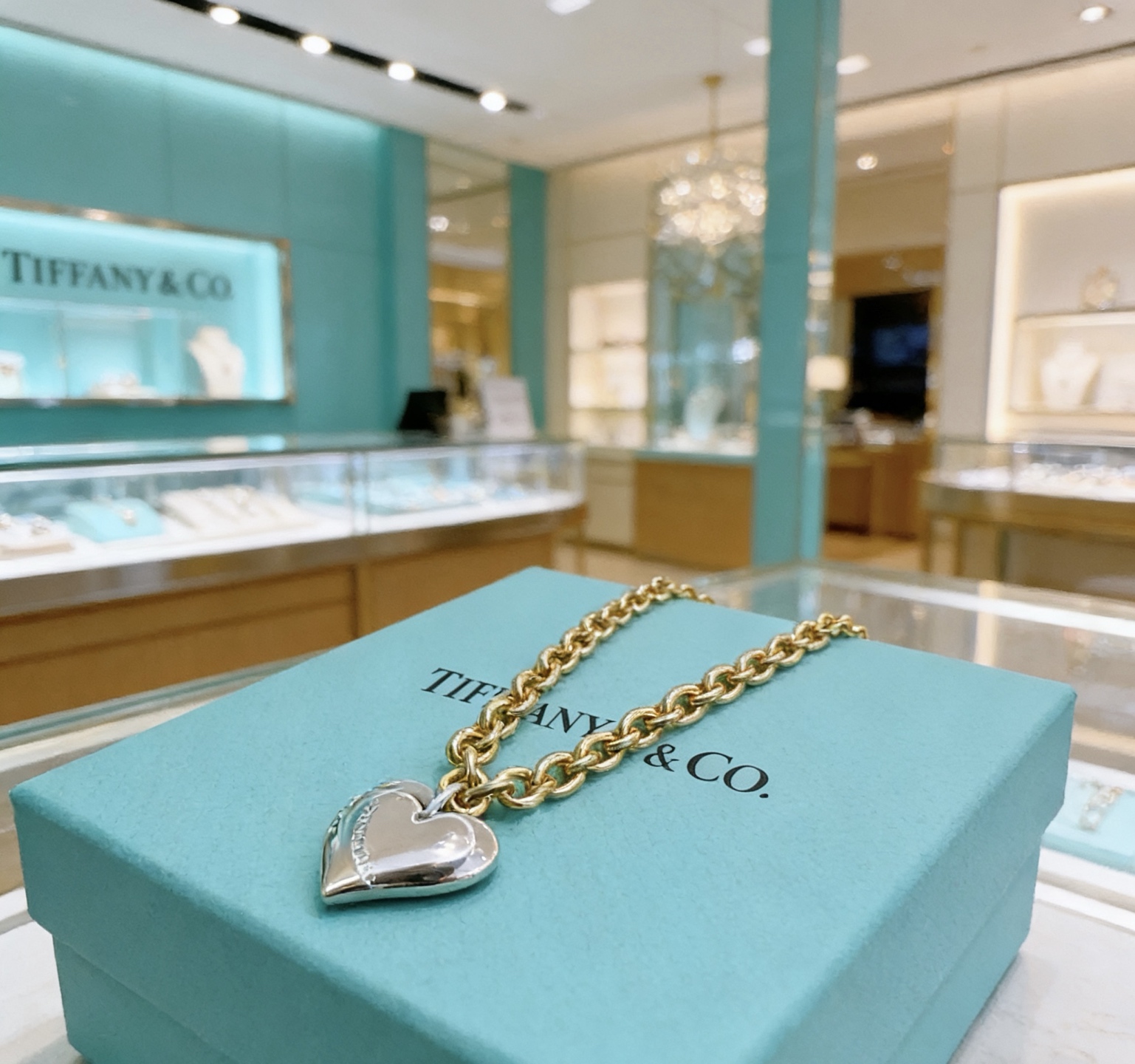 Tiffany Co Heart Tag necklace gold-tone metal chain silver-tone heart pendant 18 inches