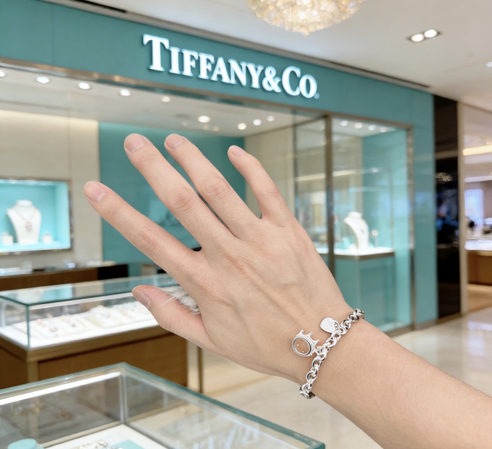 Tiffany Co Return to Tiffany Crown Charm bracelet sterling silver with black enamel heart tag 7 5 inches