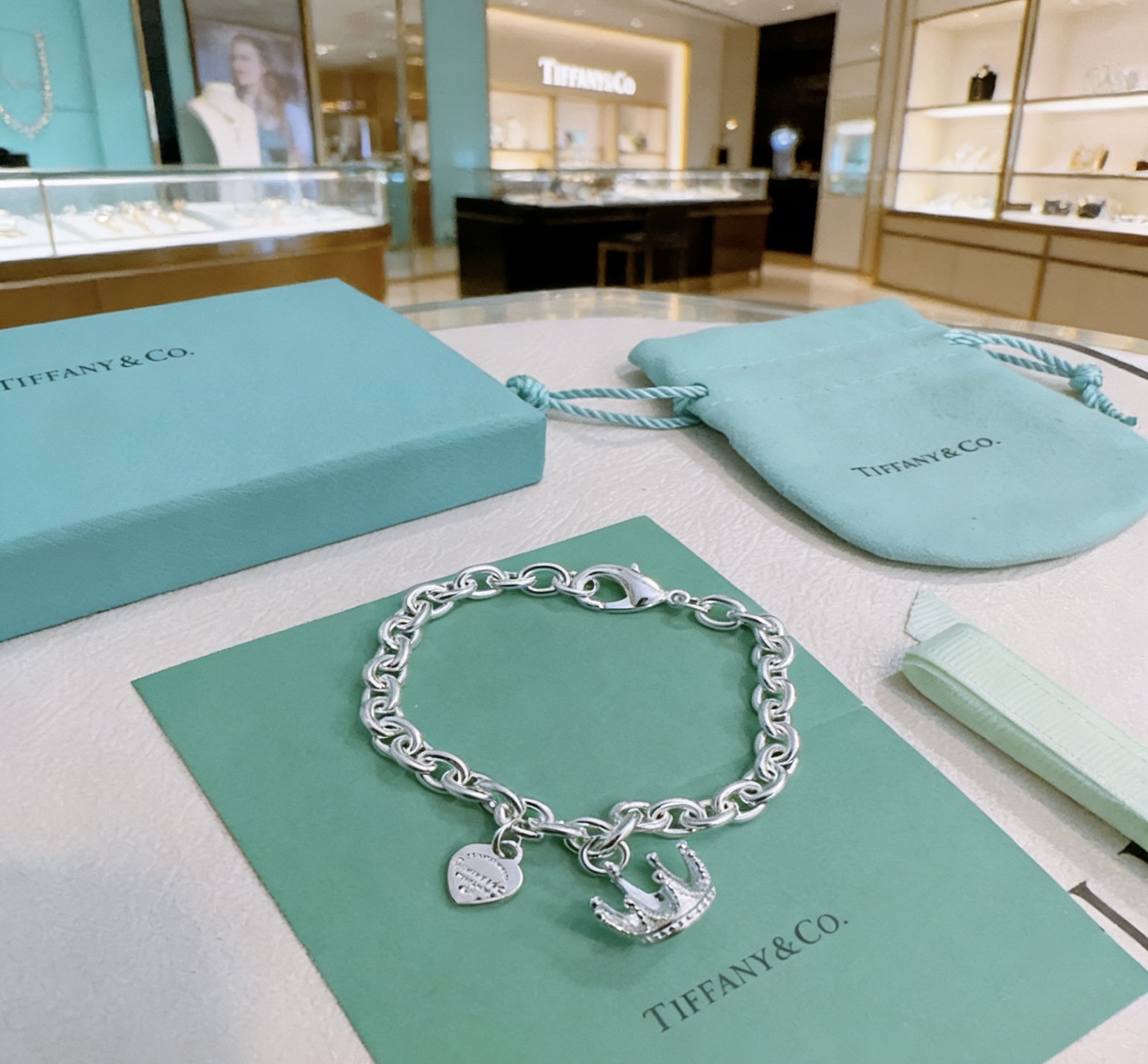 Tiffany Co Return to Tiffany Crown Charm bracelet sterling silver with black enamel heart tag 7 5 inches
