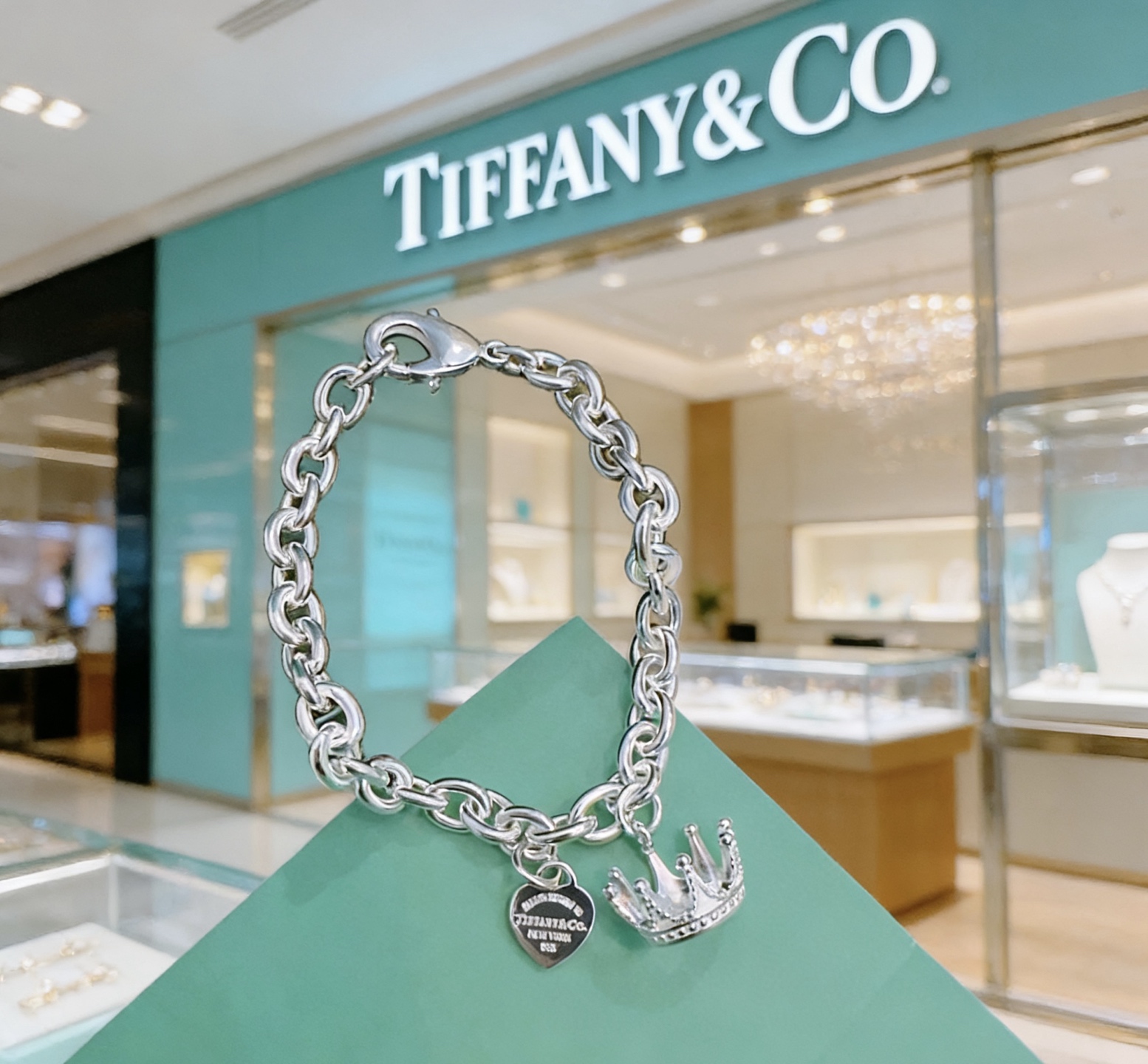 Tiffany Co Return to Tiffany Crown Charm bracelet sterling silver with black enamel heart tag 7 5 inches
