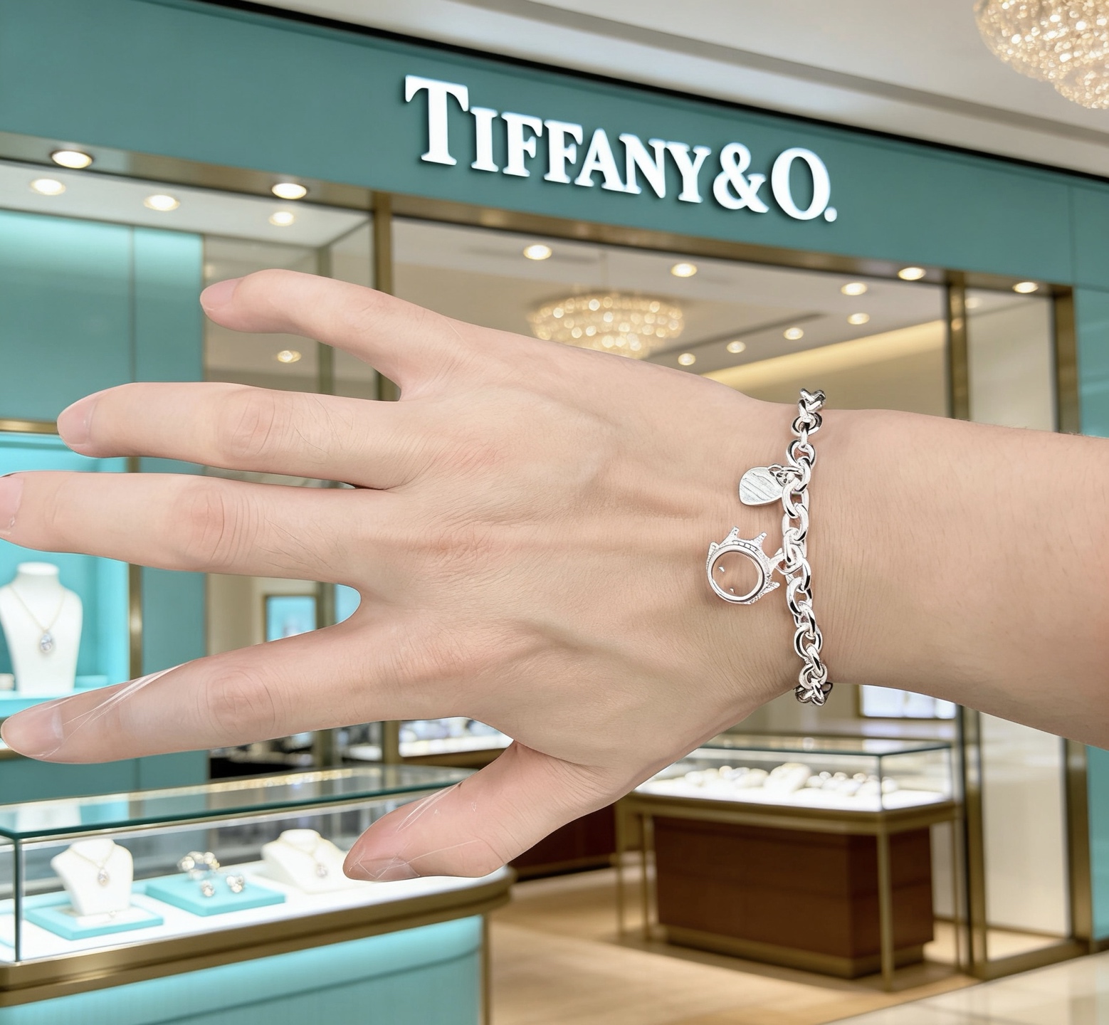 Tiffany Co Return to Tiffany Crown Charm bracelet sterling silver with black enamel heart tag 7 5 inches