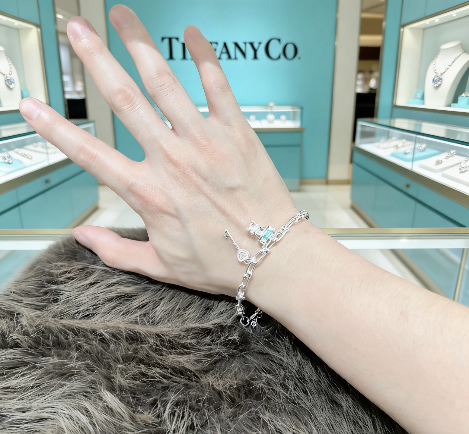 Tiffany Co HardWear Charm bracelet silver metal with light blue and pink enamel accents 18cm