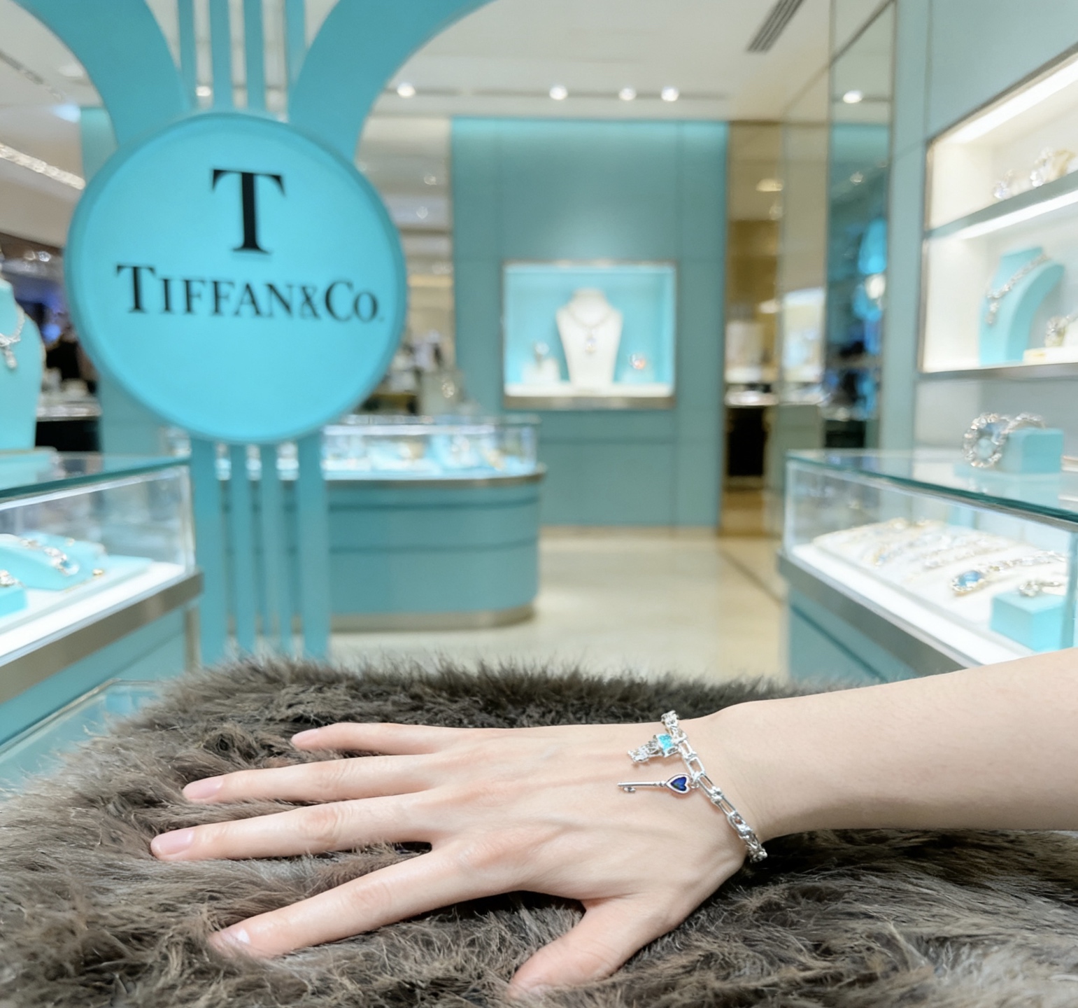 Tiffany Co HardWear Charm bracelet silver metal with light blue and pink enamel accents 18cm