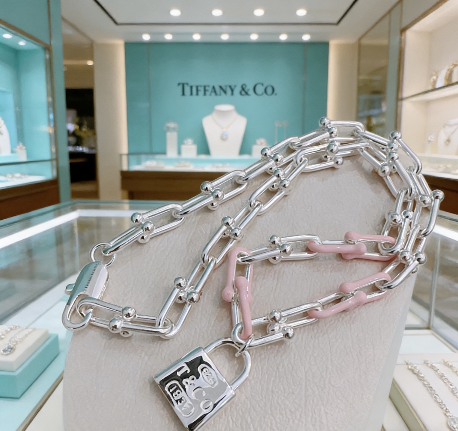 Tiffany Co HardWear Lock Pendant necklace Sterling silver with blush pink enamel accents polished silver lock pendant 55cm
