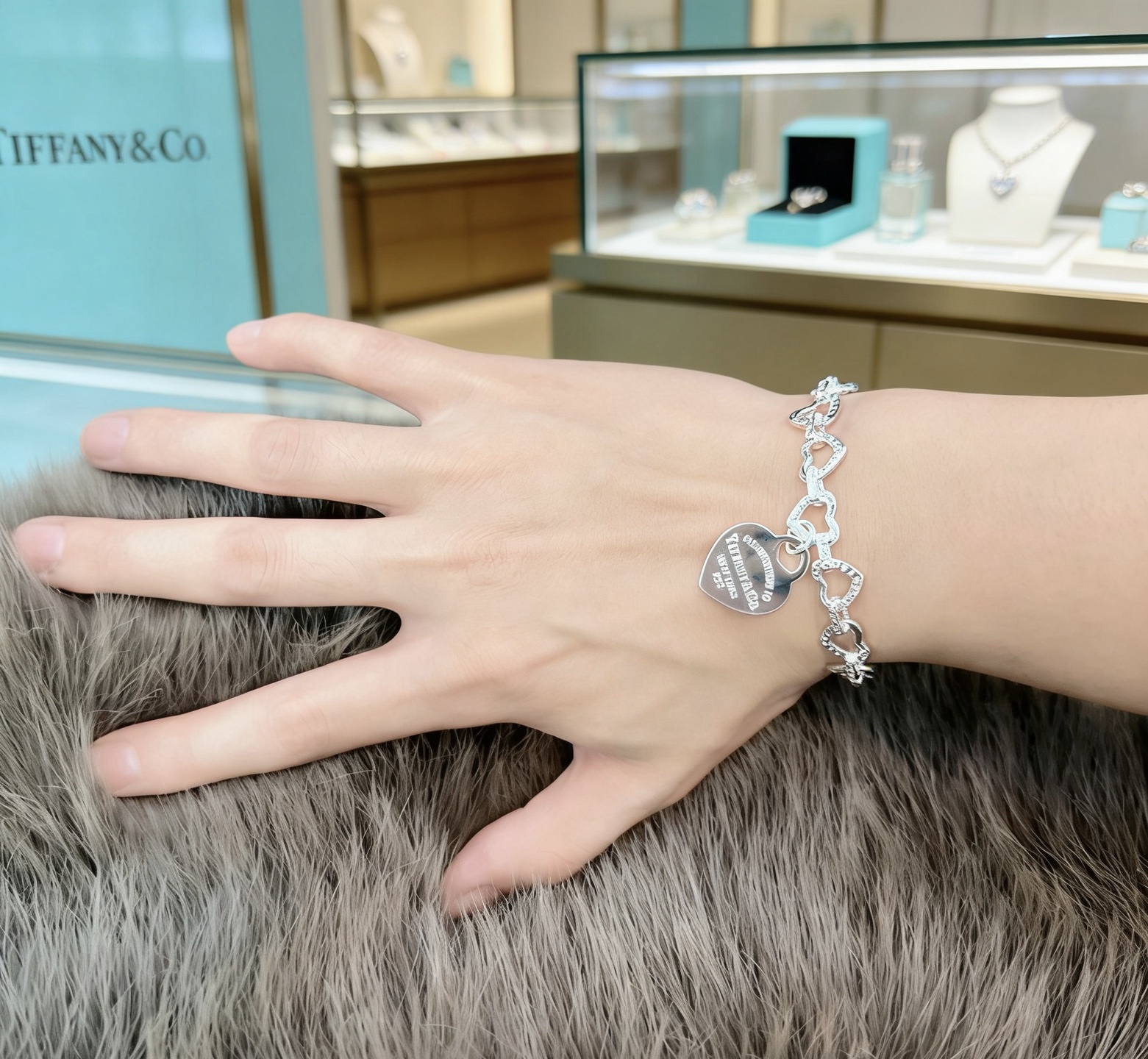 Tiffany Co Heart Link Toggle Bracelet with Pink Enamel Heart Tag bracelet silver-toned metal with clear pave accents and pink enamel heart charm 7 inches