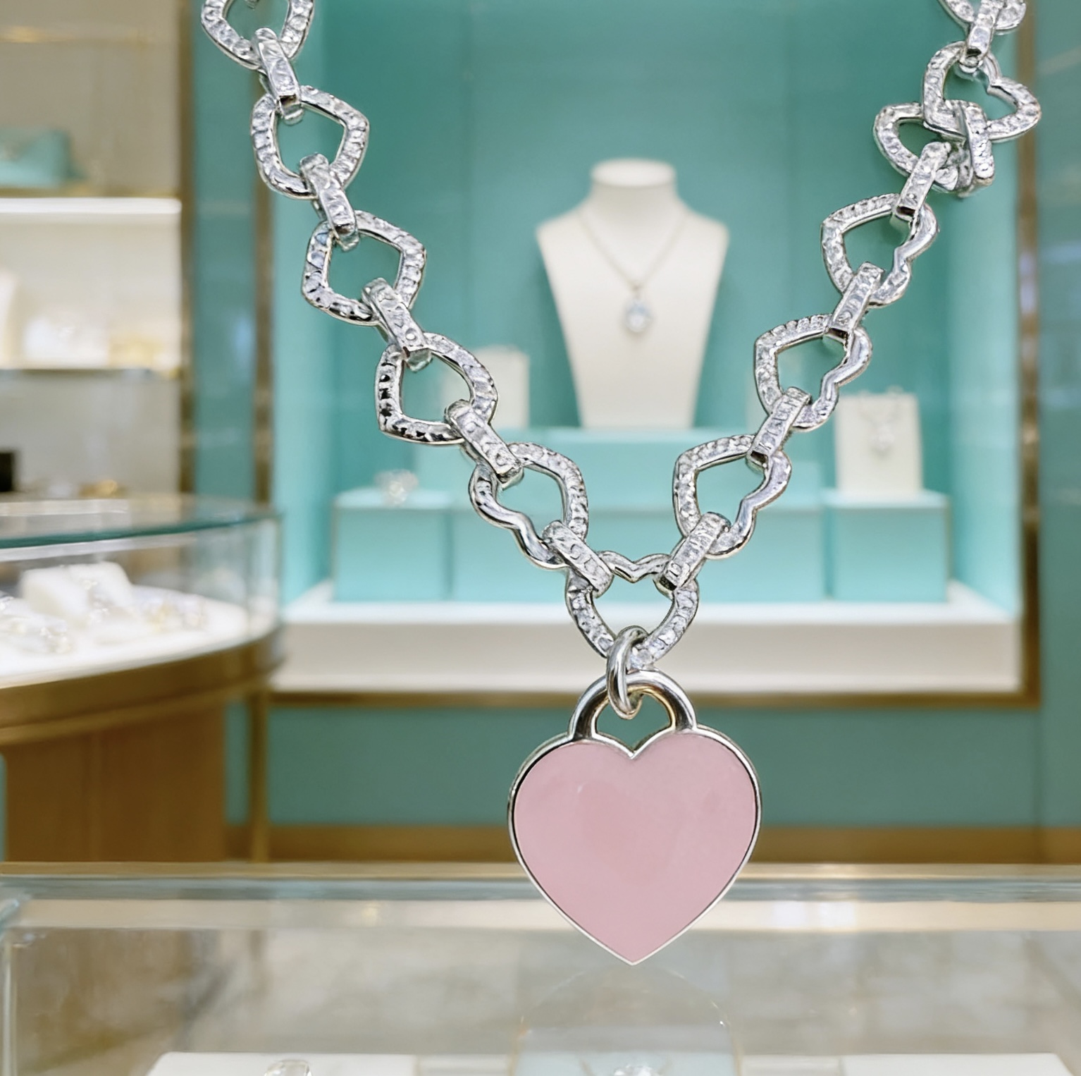 Tiffany Co Heart Link Toggle Bracelet with Pink Enamel Heart Tag bracelet silver-toned metal with clear pave accents and pink enamel heart charm 7 inches