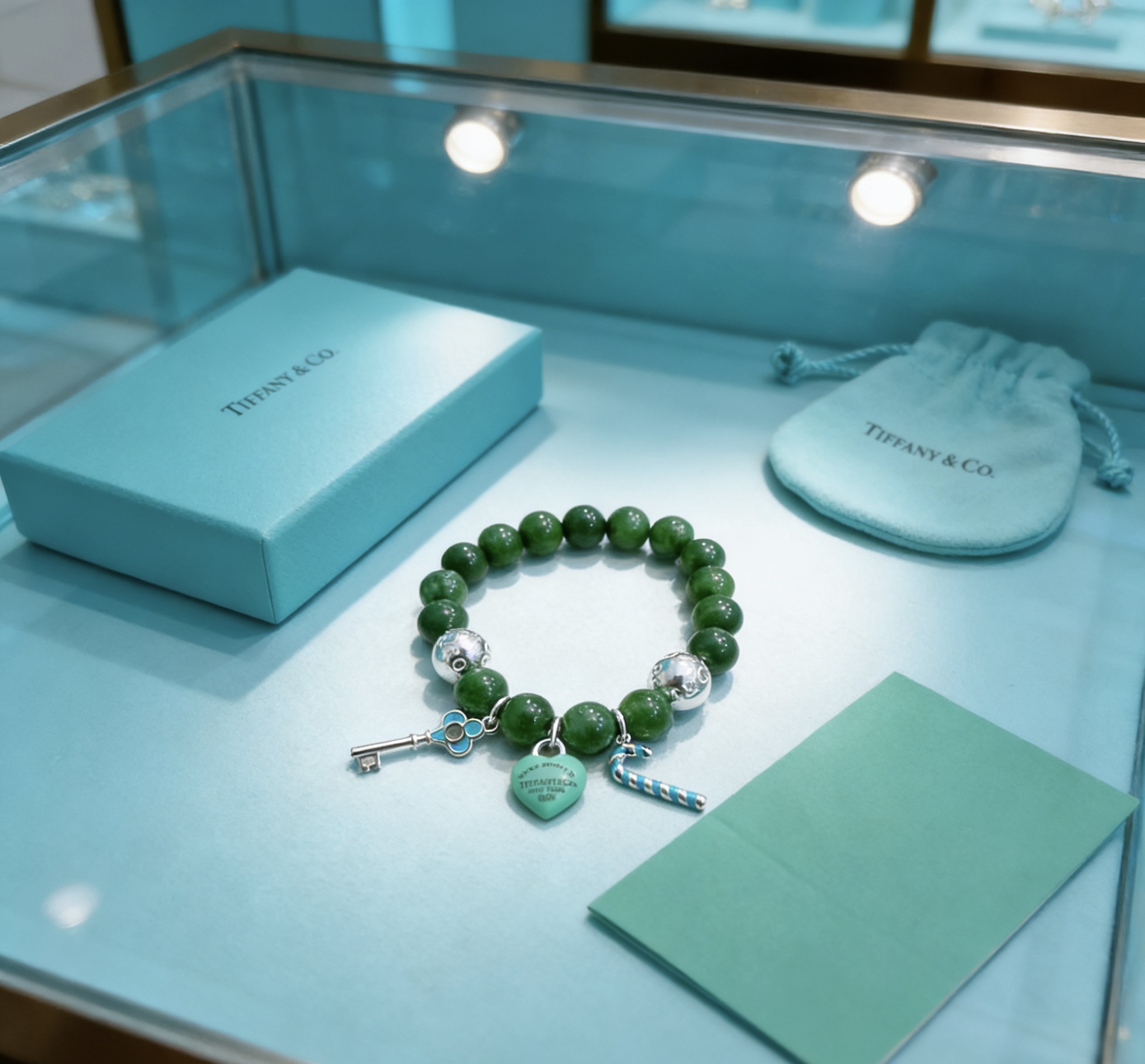 Tiffany Co Return to Tiffany Charm Bead Bracelet bracelet Sterling silver with dark green jade beads Tiffany Blue enamel accents 7 inches