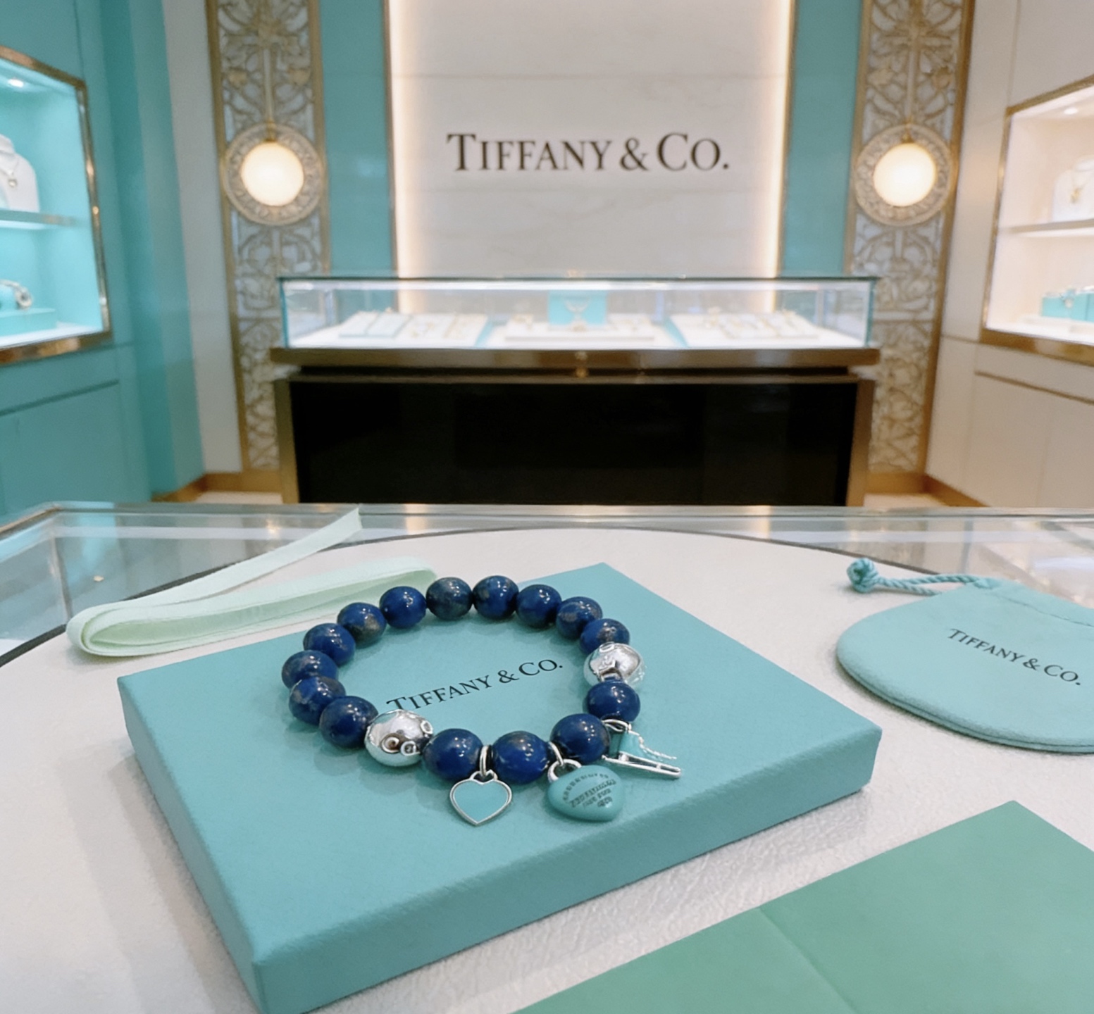 Tiffany Co Return to Tiffany Charm Bead Bracelet bracelet Sterling silver with deep blue lapis lazuli beads and signature Tiffany Blue enamel charms 18cm