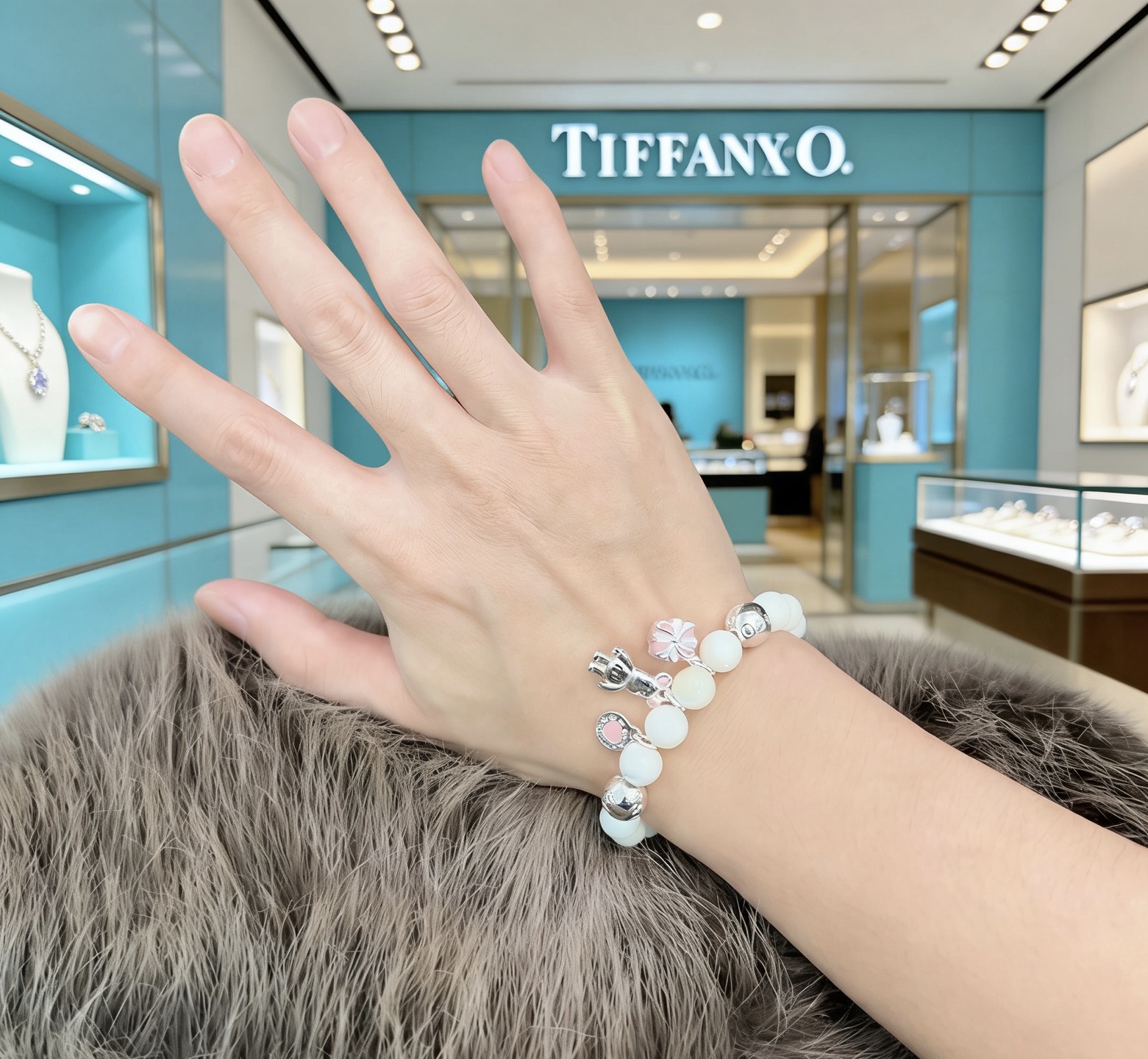 Tiffany Co Charm Bead Bracelet bracelet Silver-toned metal with white mother-of-pearl beads pink enamel accents on charms 17cm