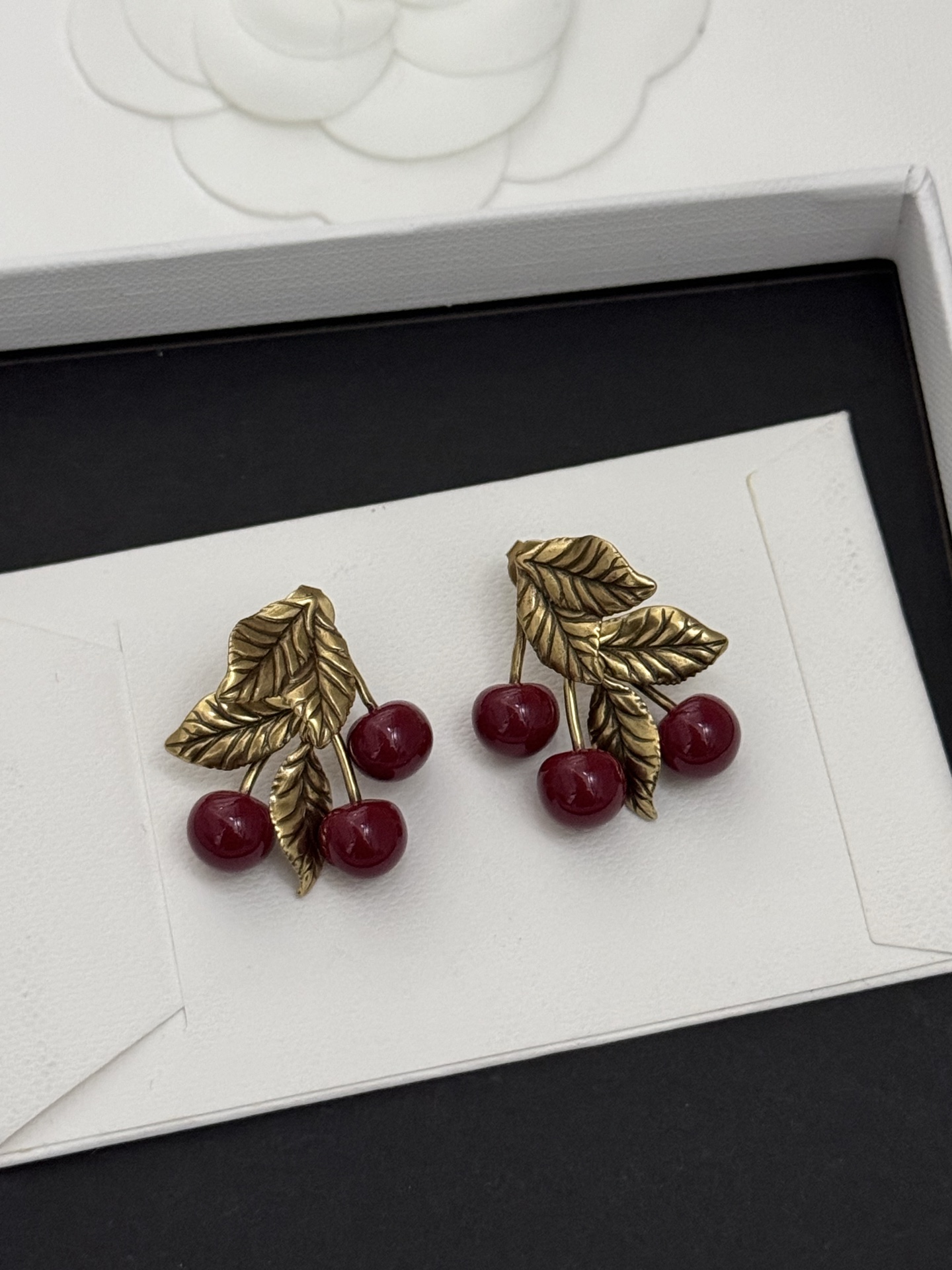 Saint Laurent Cherry Motif earrings antique gold metal deep burgundy red resin cherries 2 5cm length