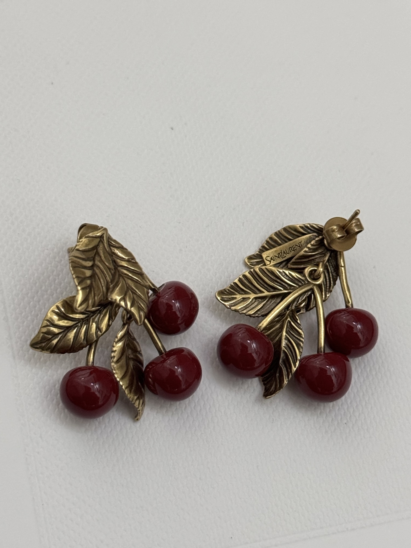 Saint Laurent Cherry Motif earrings antique gold metal deep burgundy red resin cherries 2 5cm length