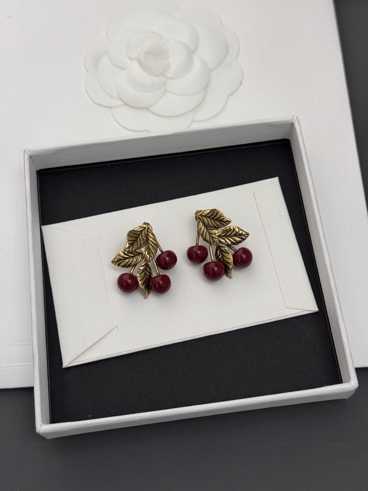 Saint Laurent Cherry Motif earrings antique gold metal deep burgundy red resin cherries 2 5cm length