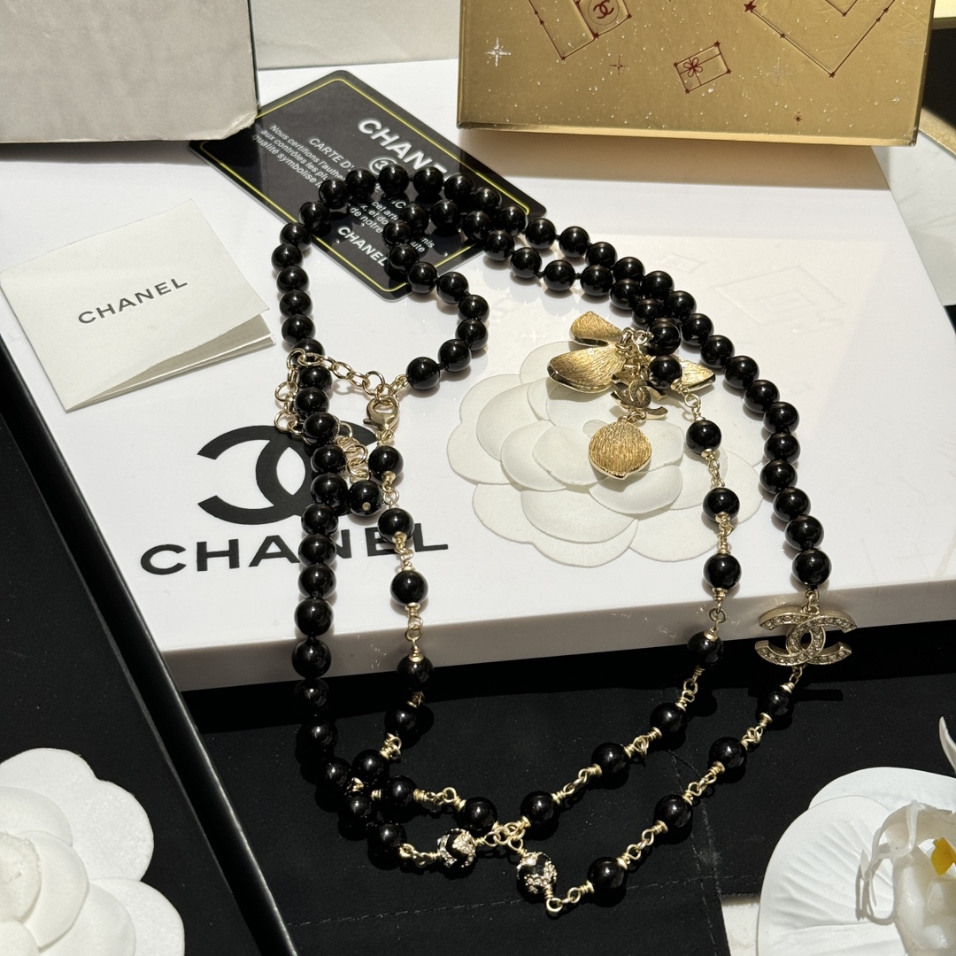 Chanel CC Zebra Stripe Flower Pendant Long Beaded Necklace necklace Gold-tone metal black resin beads black enamel clear crystal accents 80cm