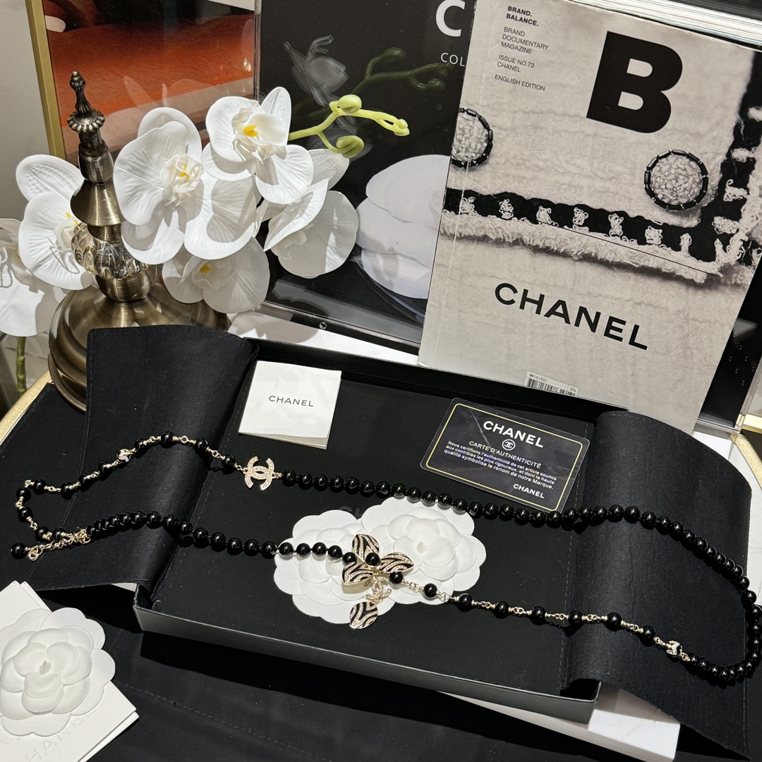 Chanel CC Zebra Stripe Flower Pendant Long Beaded Necklace necklace Gold-tone metal black resin beads black enamel clear crystal accents 80cm
