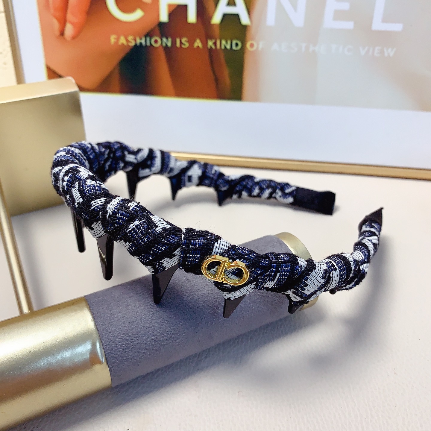 Chanel Crystal Logo Spiked Headband brooch Red fabric with black spikes and silver-tone crystal logo Black and white tweed fabric with black spikes and gold-tone CD logo One Size