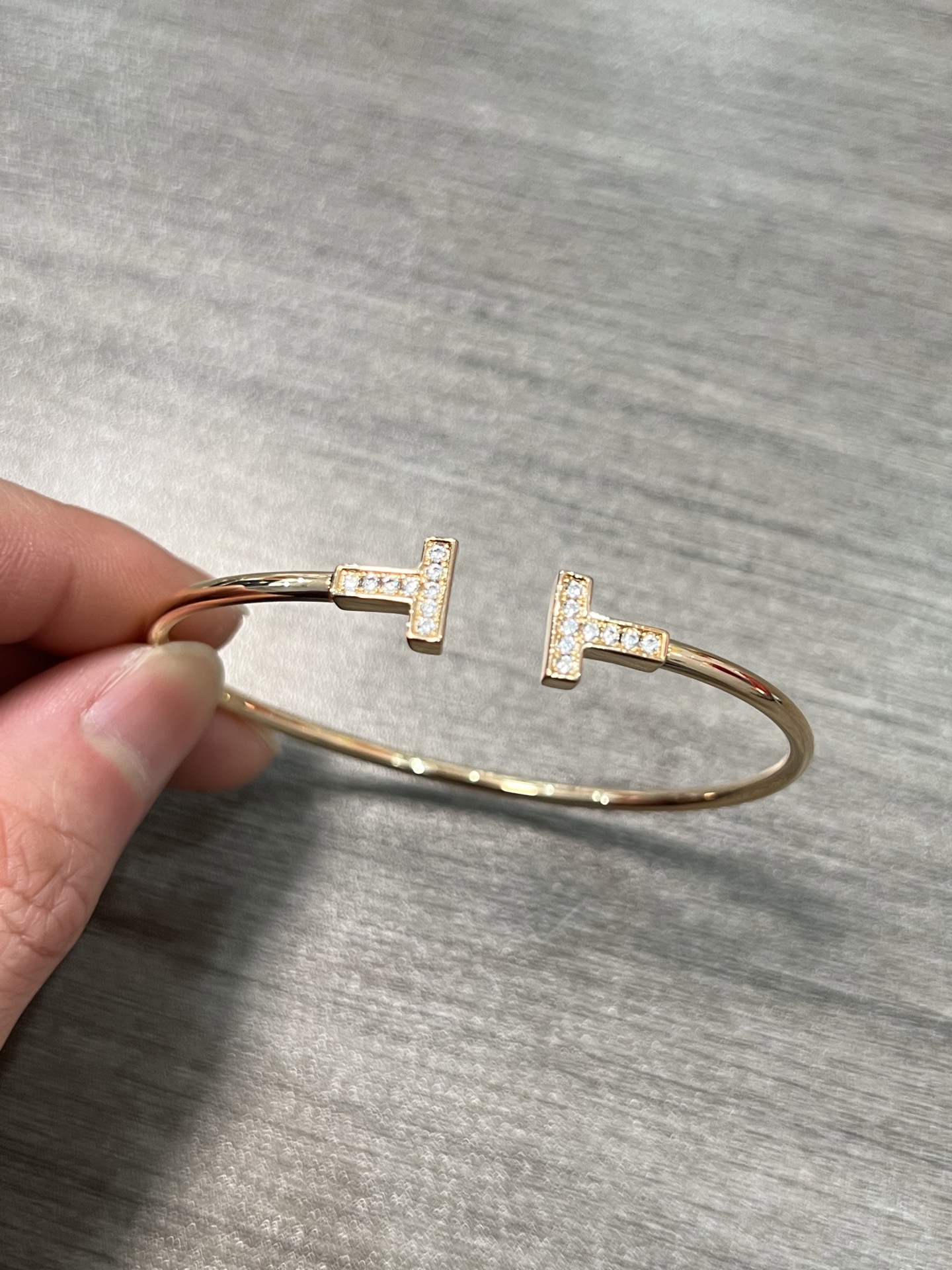 Tiffany Tiffany T bracelet 18k rose gold with clear diamond pave accents 17cm inner circumference