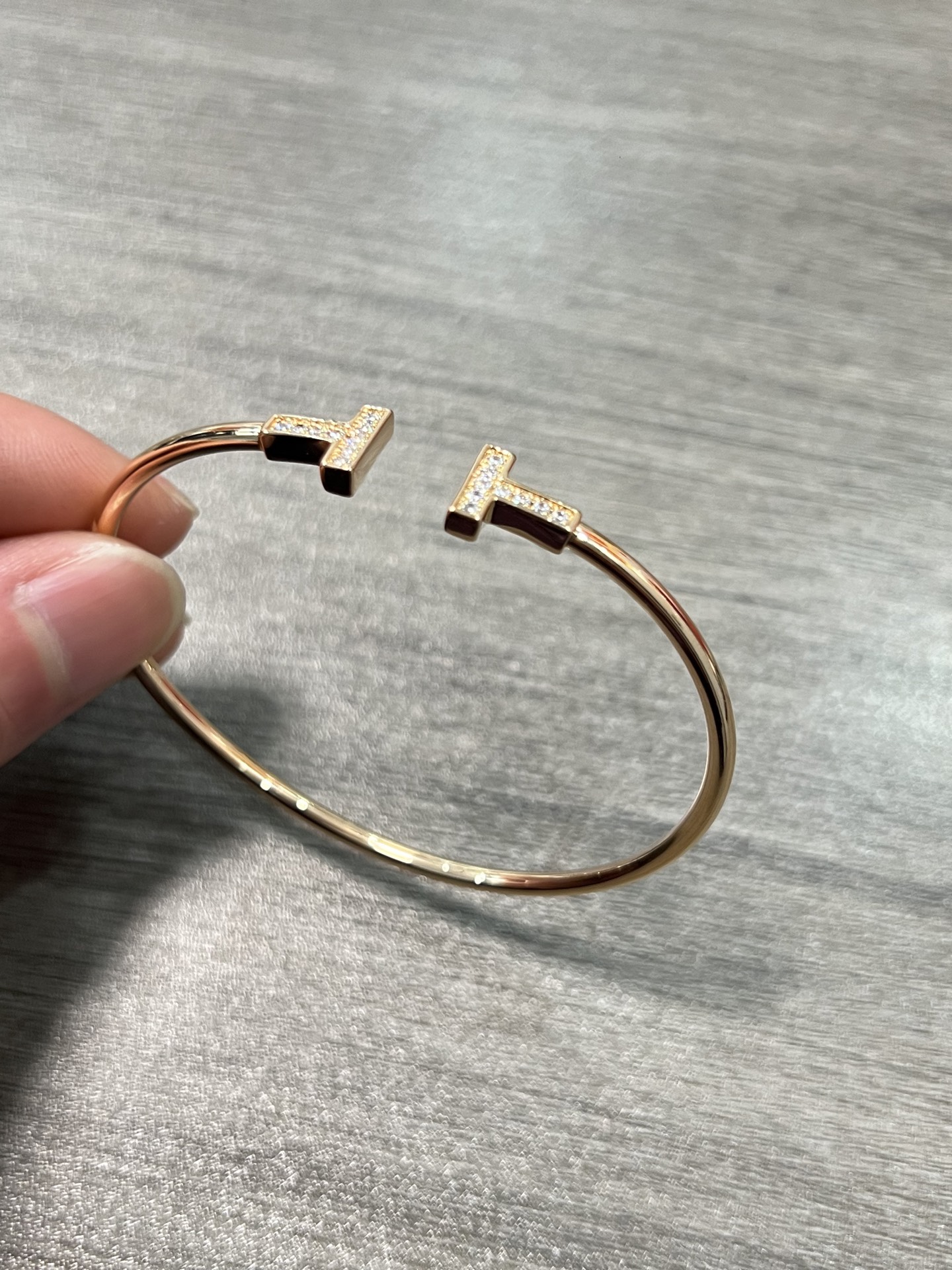 Tiffany Tiffany T bracelet 18k rose gold with clear diamond pave accents 17cm inner circumference